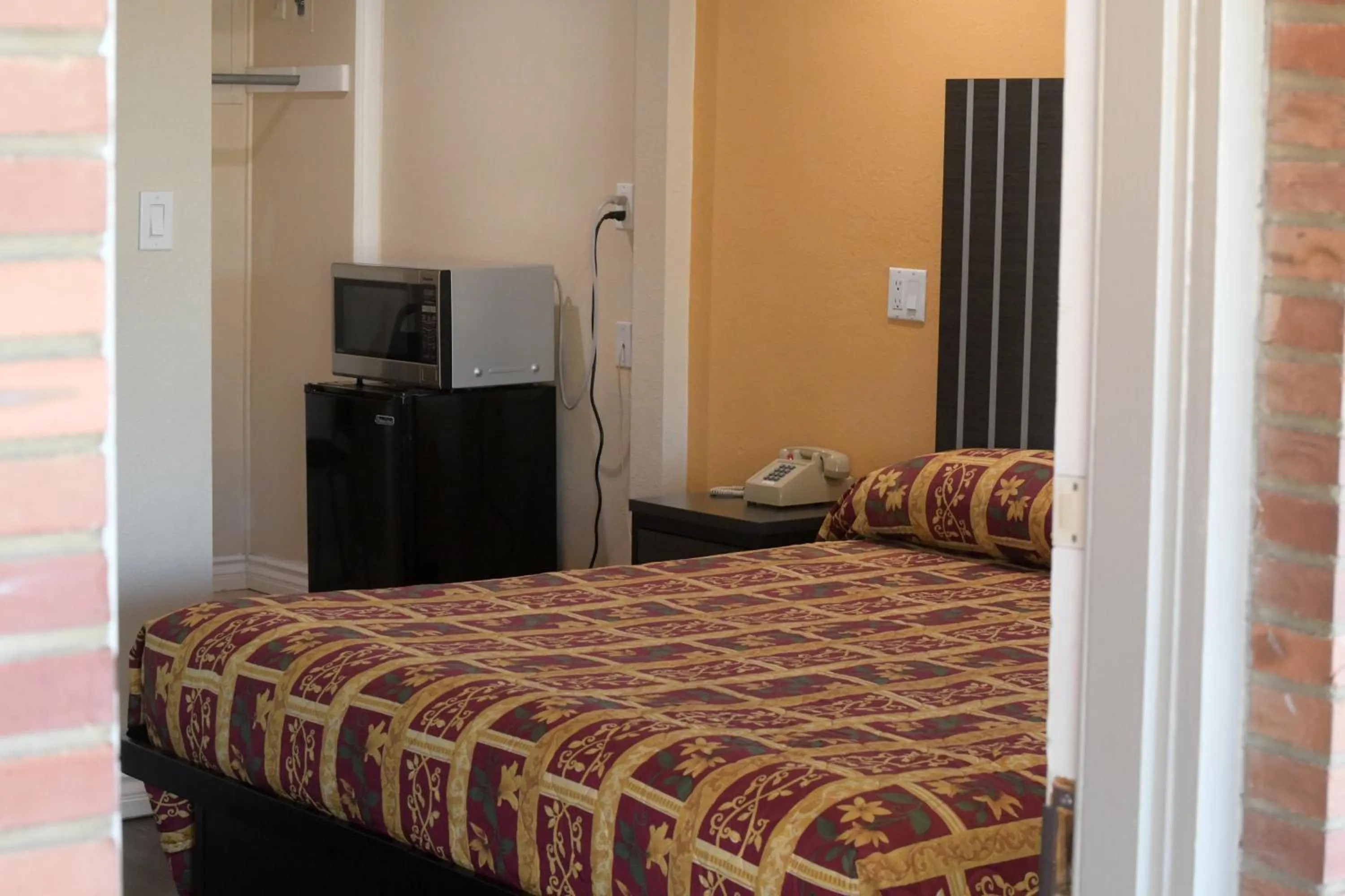 Bed in A-1 Budget Motel