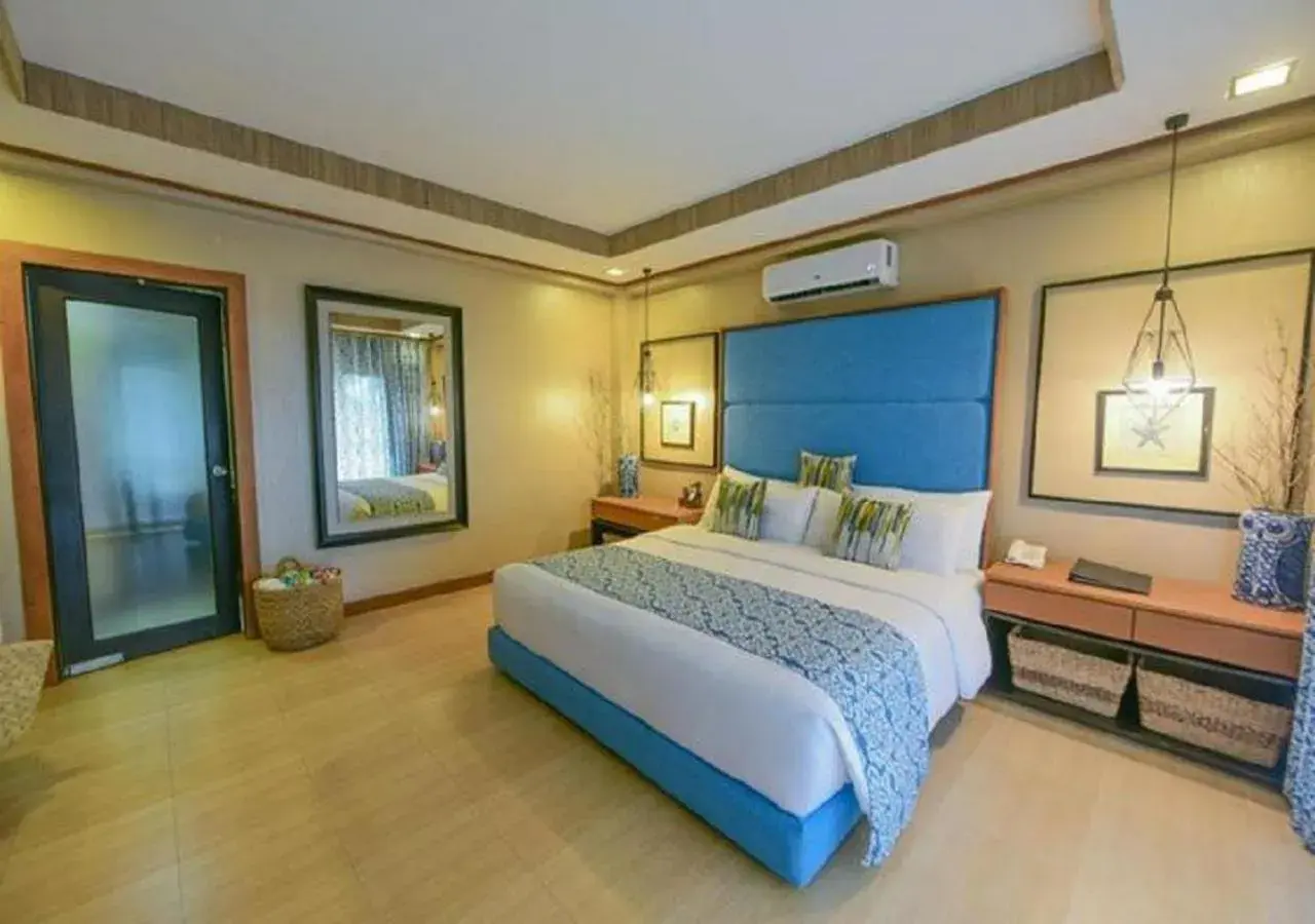 Bed in Tugawe Cove Resort Bed in Tugawe Cove Resort