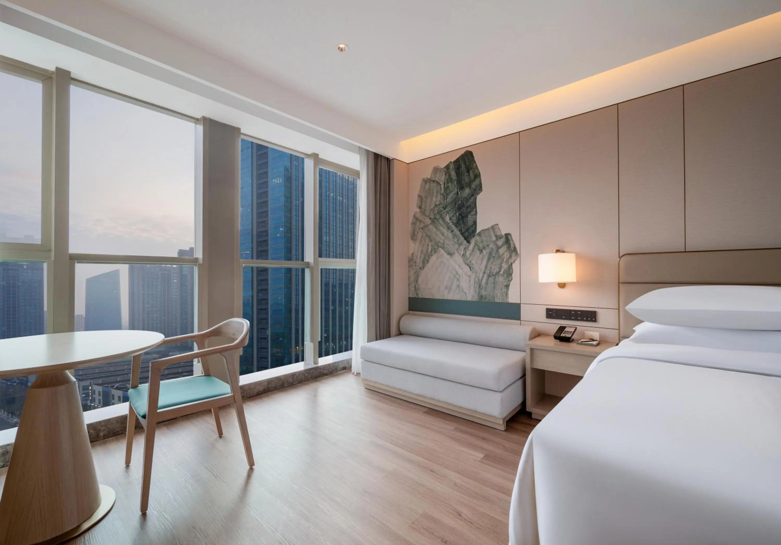 Bed in Manju Hotel Shaoxing Keqiao Wanda