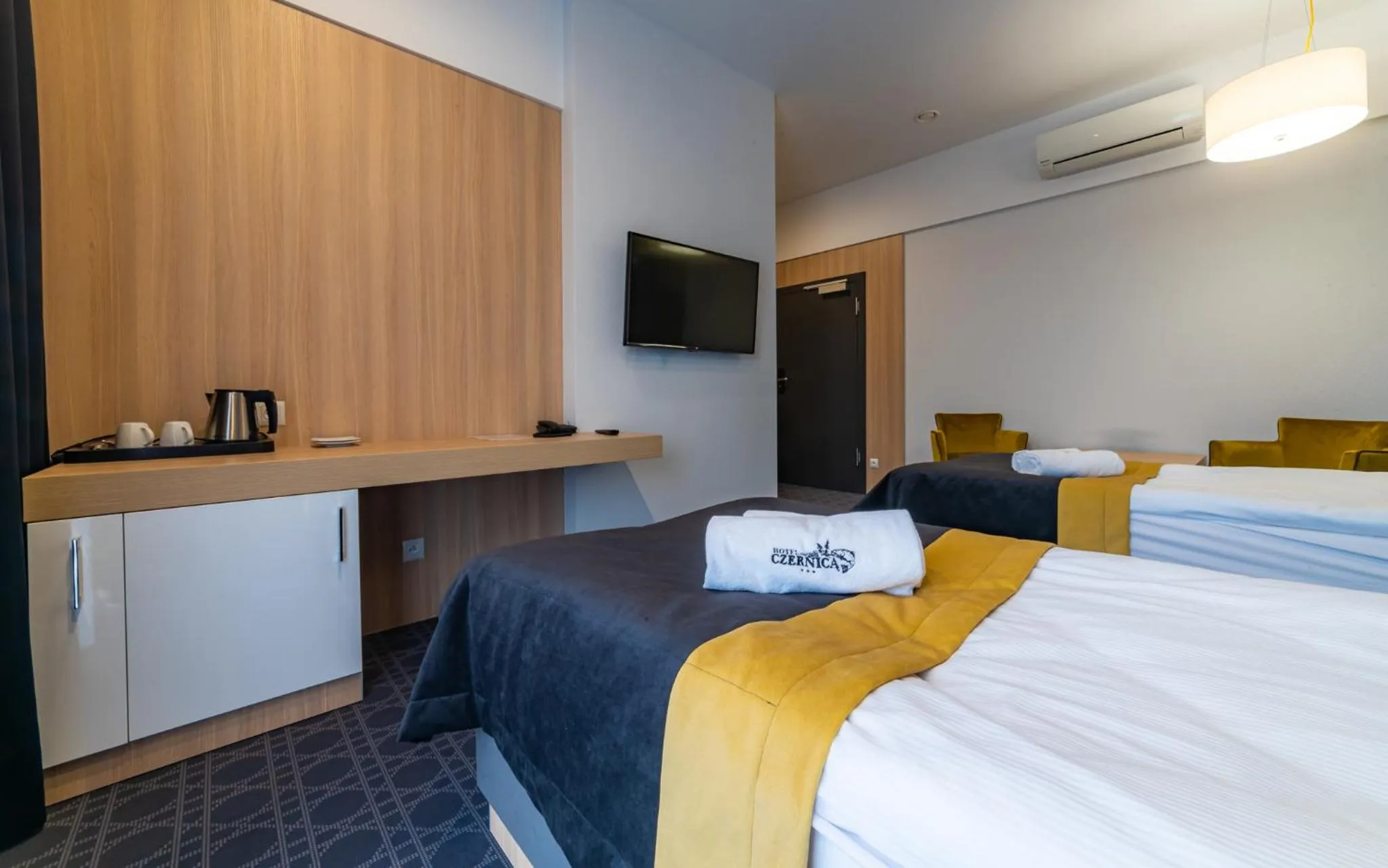 Communal lounge/ TV room, Bed in Hotel Nad Czernicą