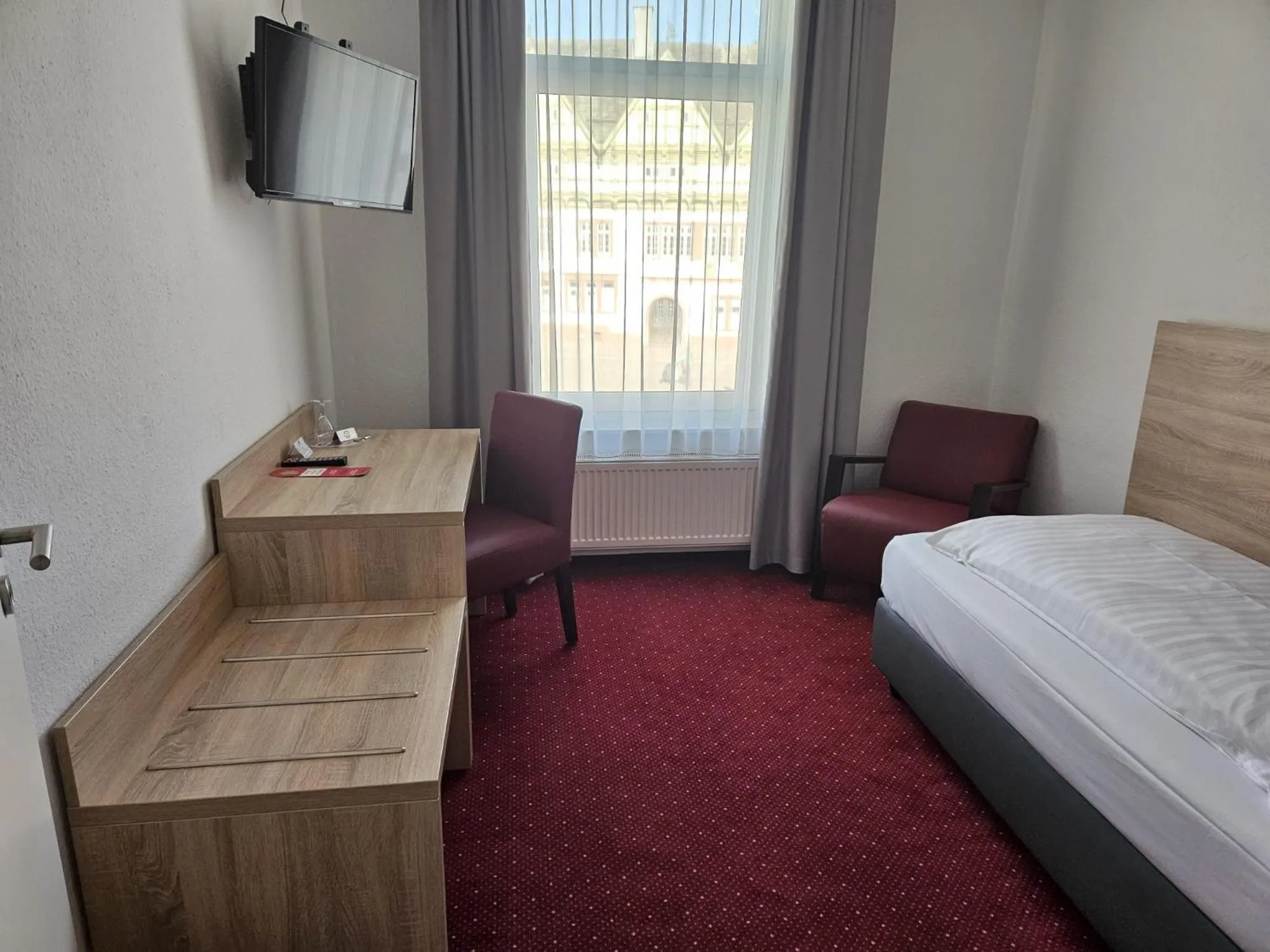 Bed in Hotel Deutsches Haus