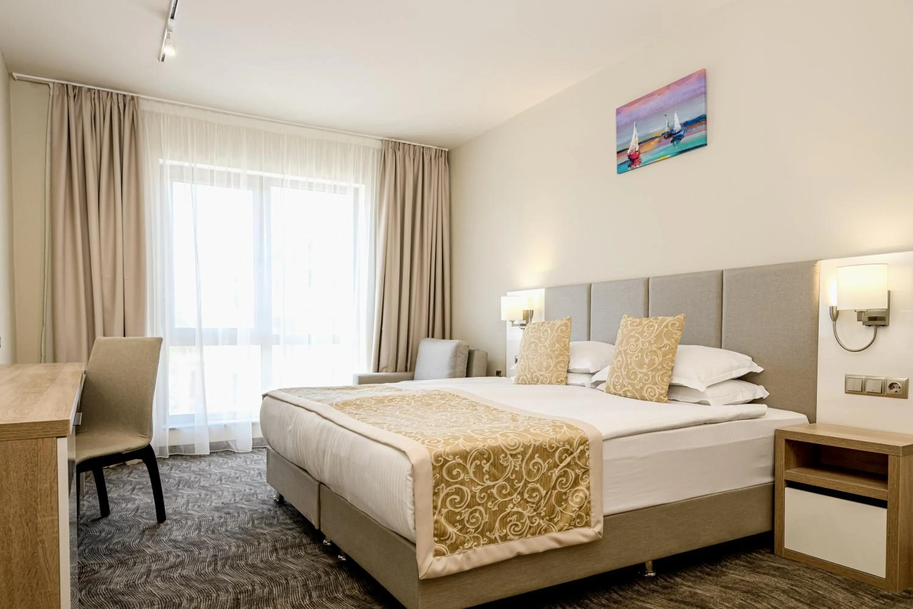 Bed in Hotel Laguna Park Sunrise