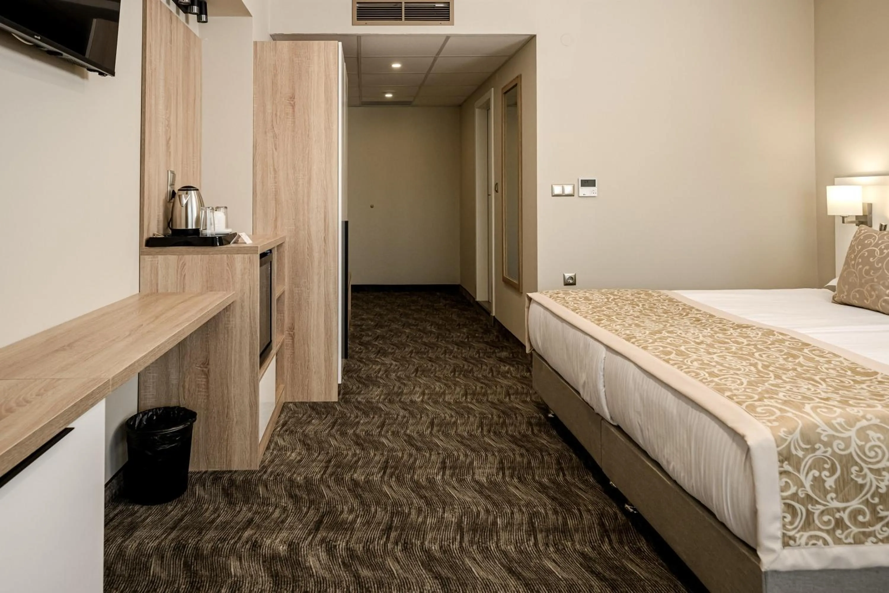 Bed in Hotel Laguna Park Sunrise