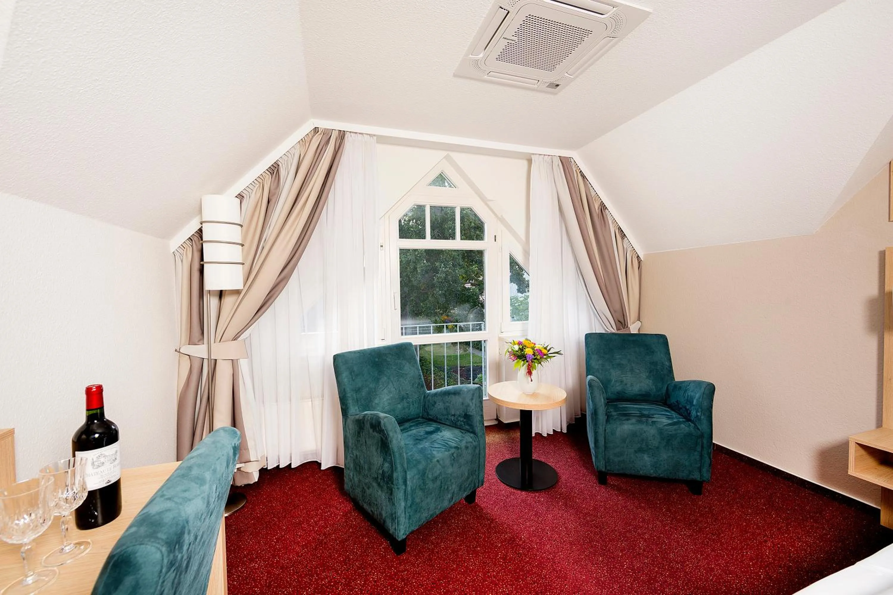 Seating area in Garni Eden Hotels