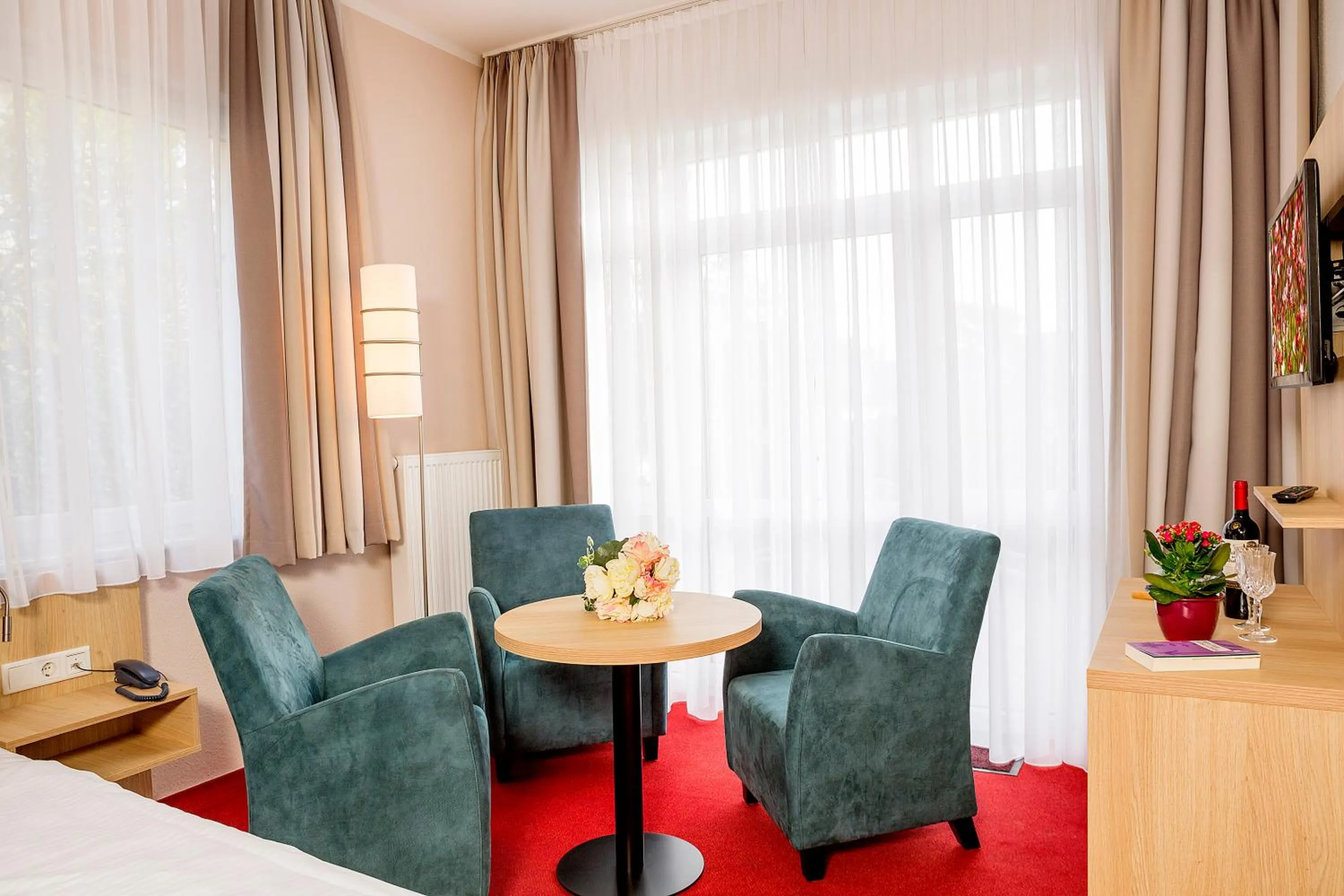 Seating area in Garni Eden Hotels