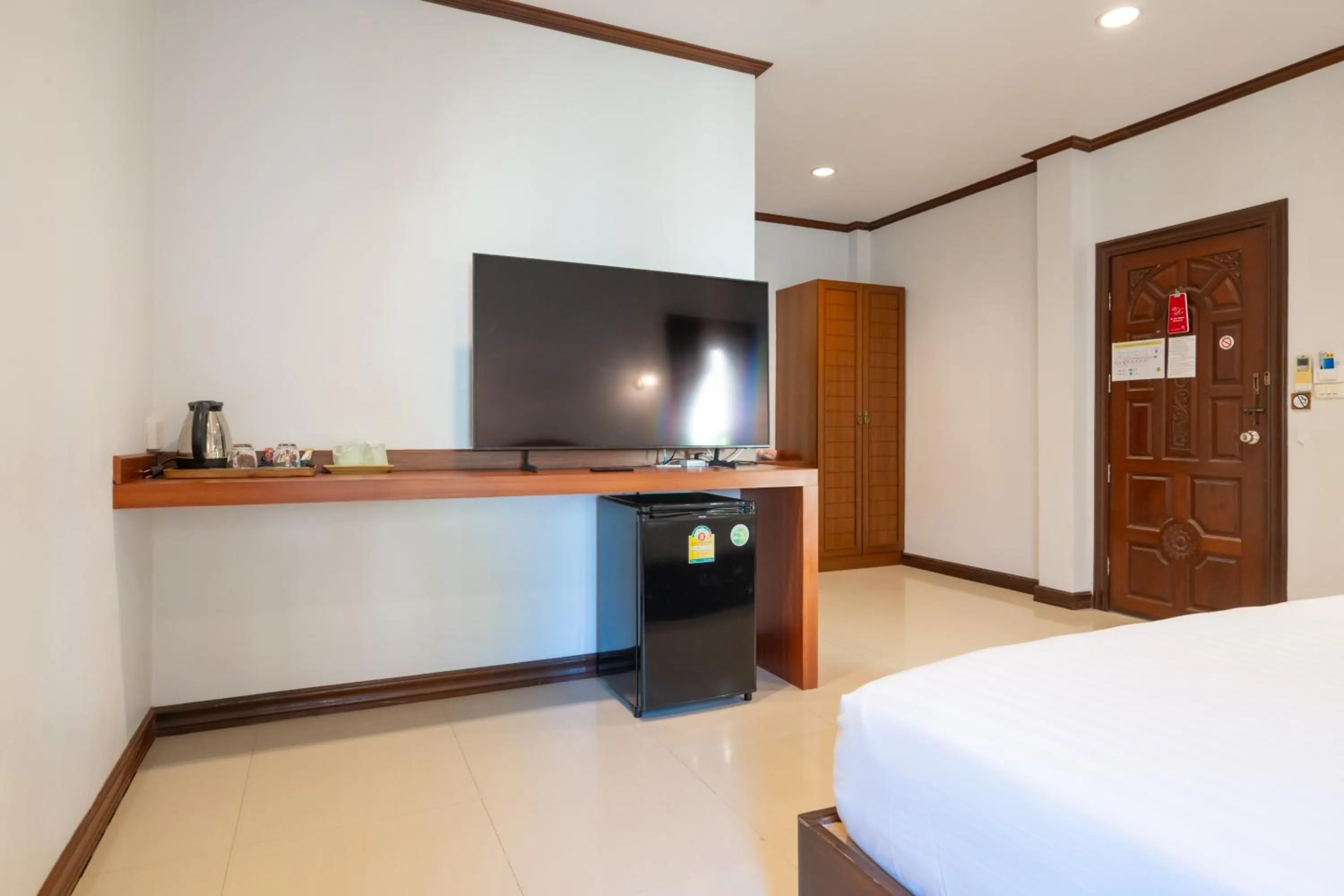 Bed in The Green Beach Resort