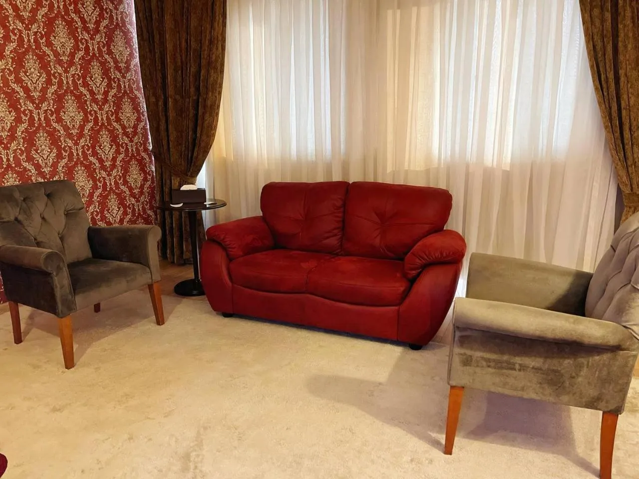 Seating area in Noble Hotel