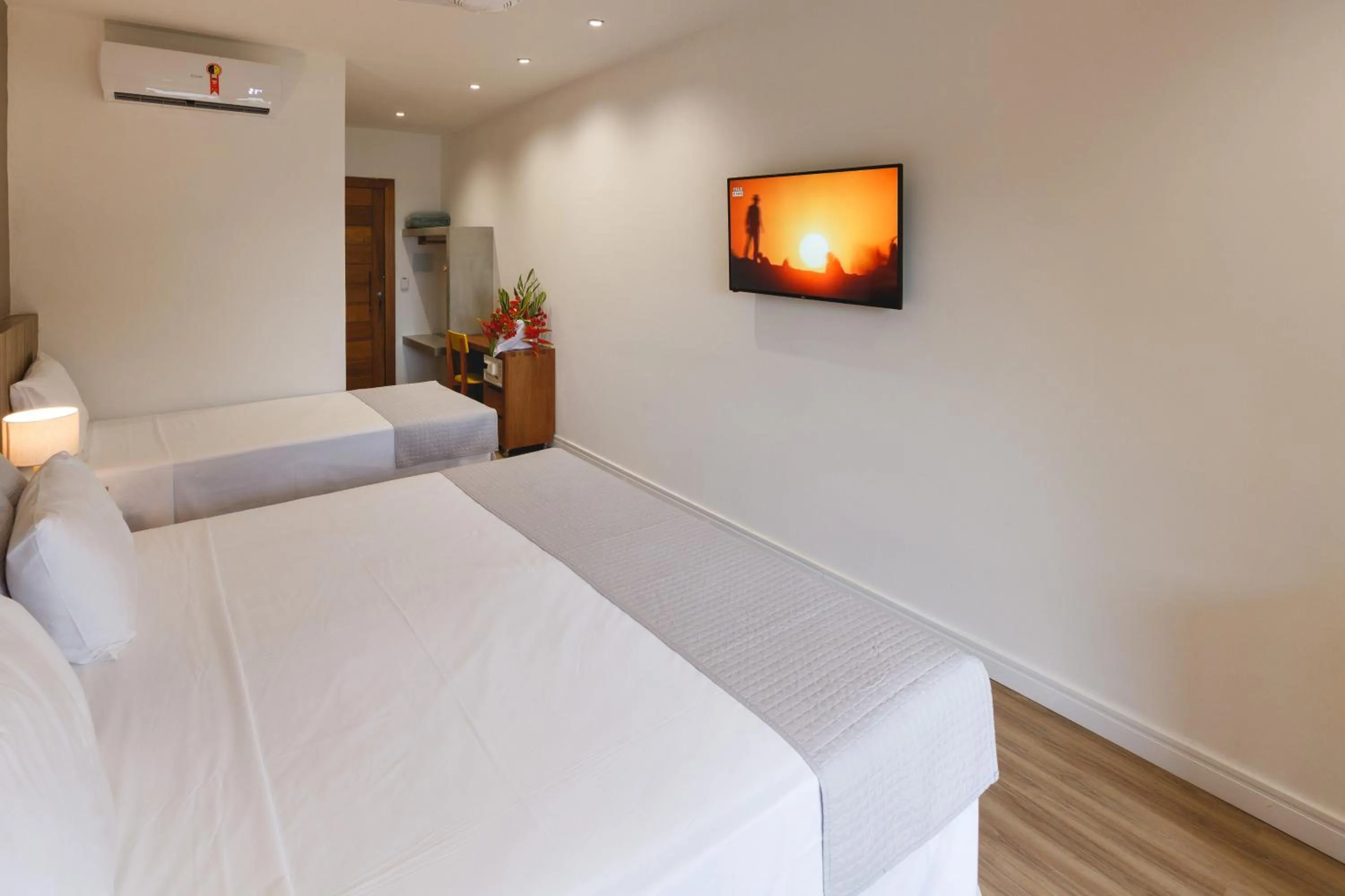 Bed in Carambola Hotel