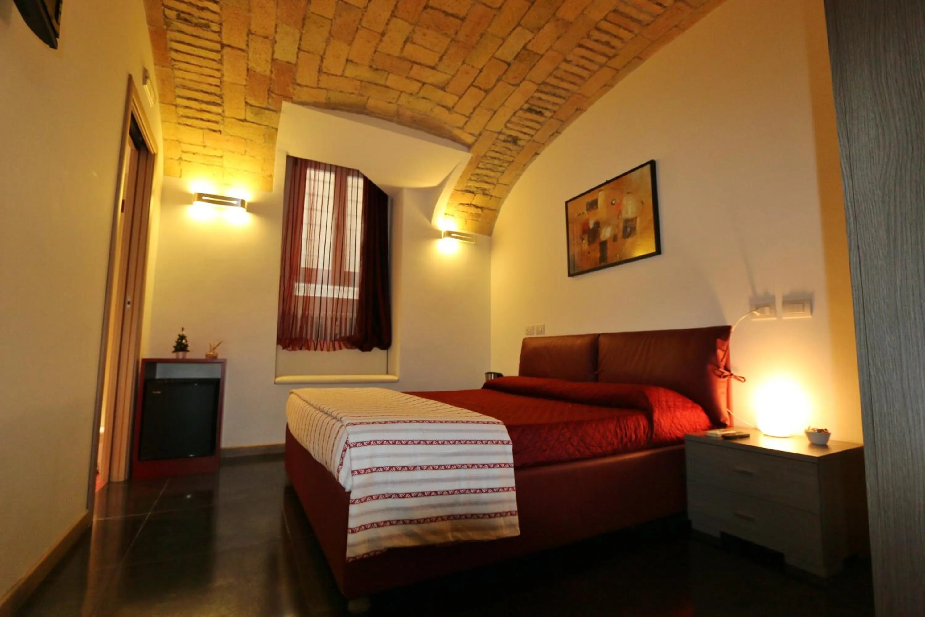 Photo of the whole room, Bed in Residenza Adriana