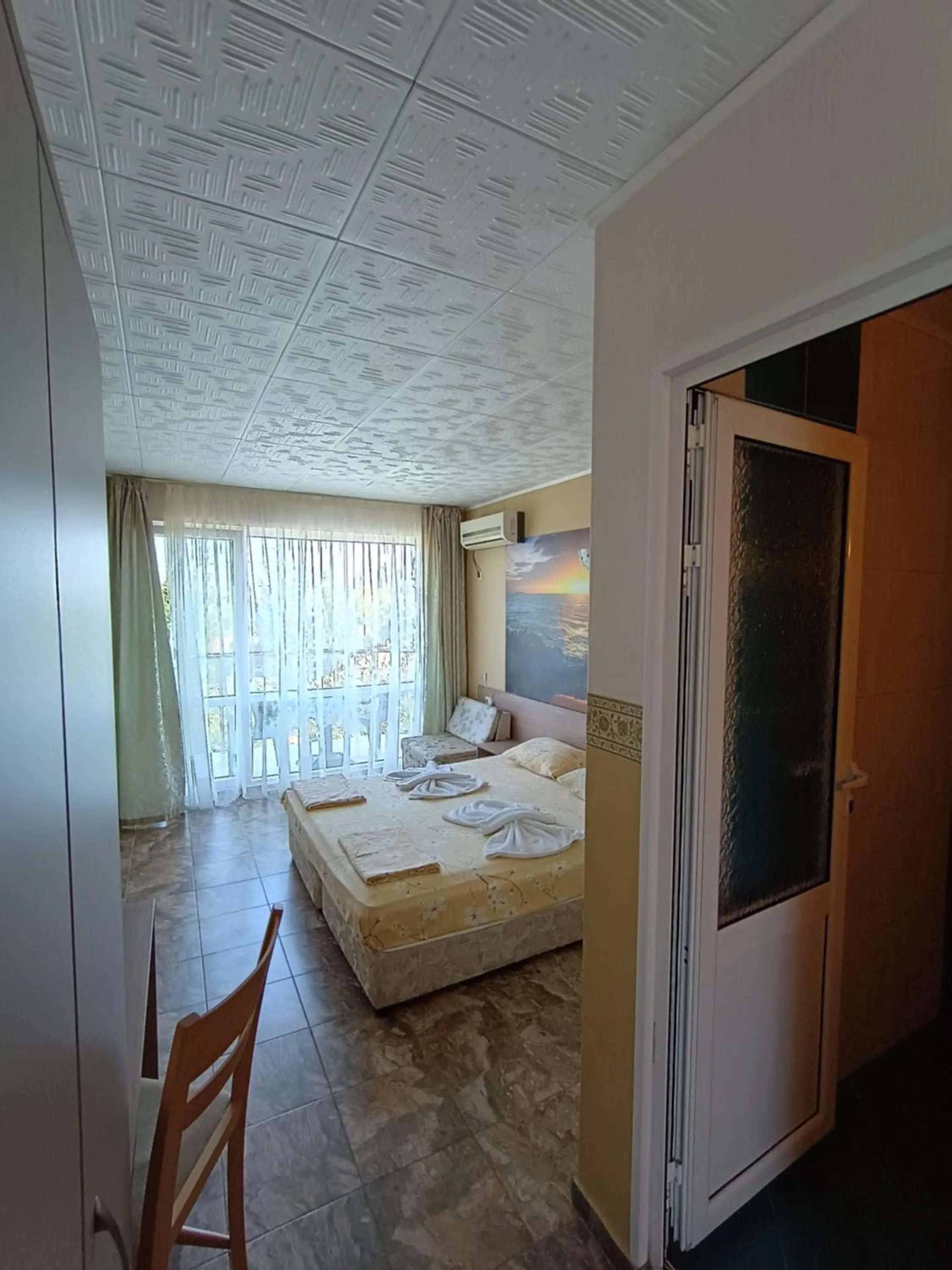 Communal lounge/ TV room, Bed in Morska Zvezda Guest House