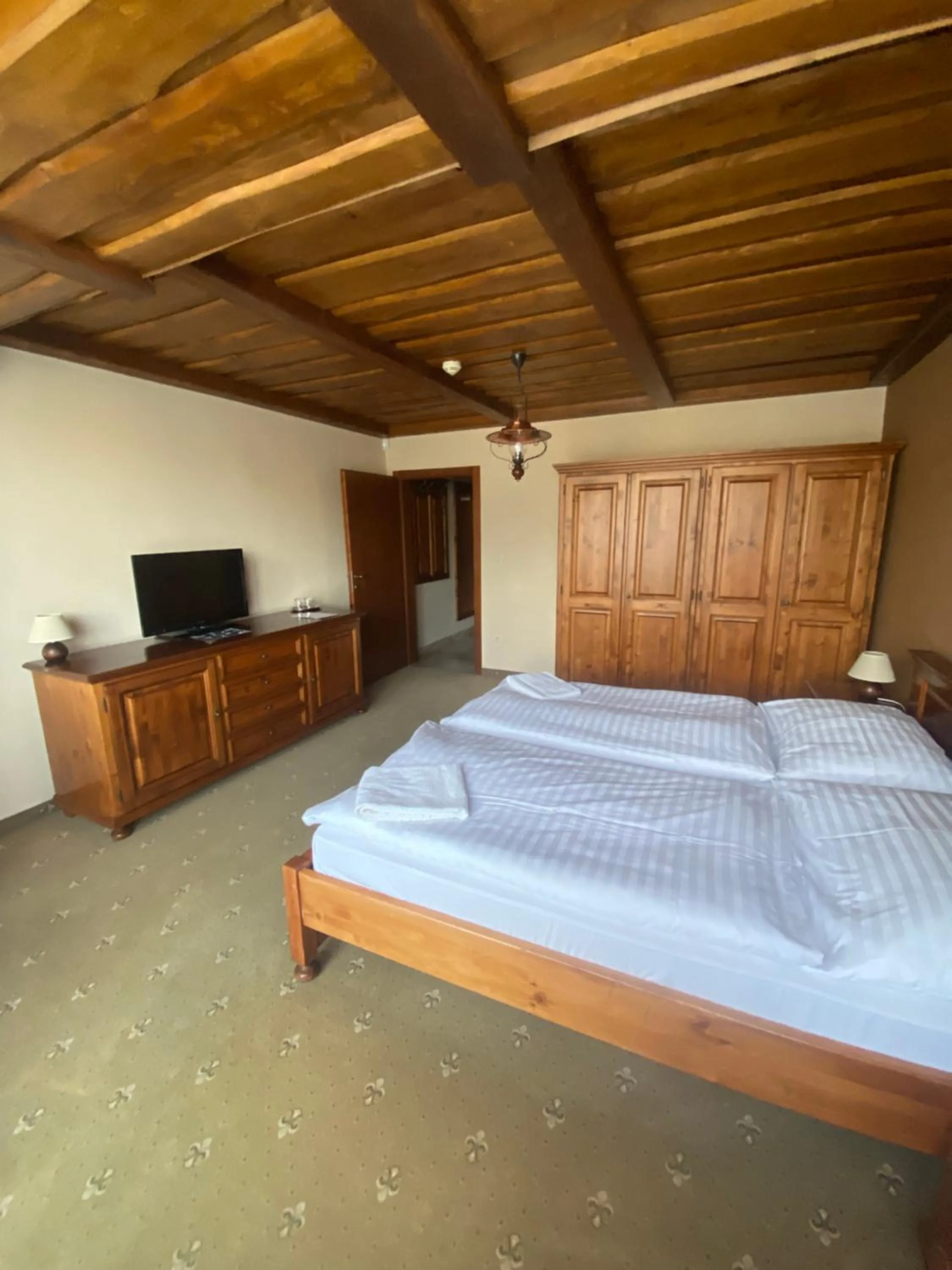 Photo of the whole room, Bed in Wellness Hotel Encian Donovaly