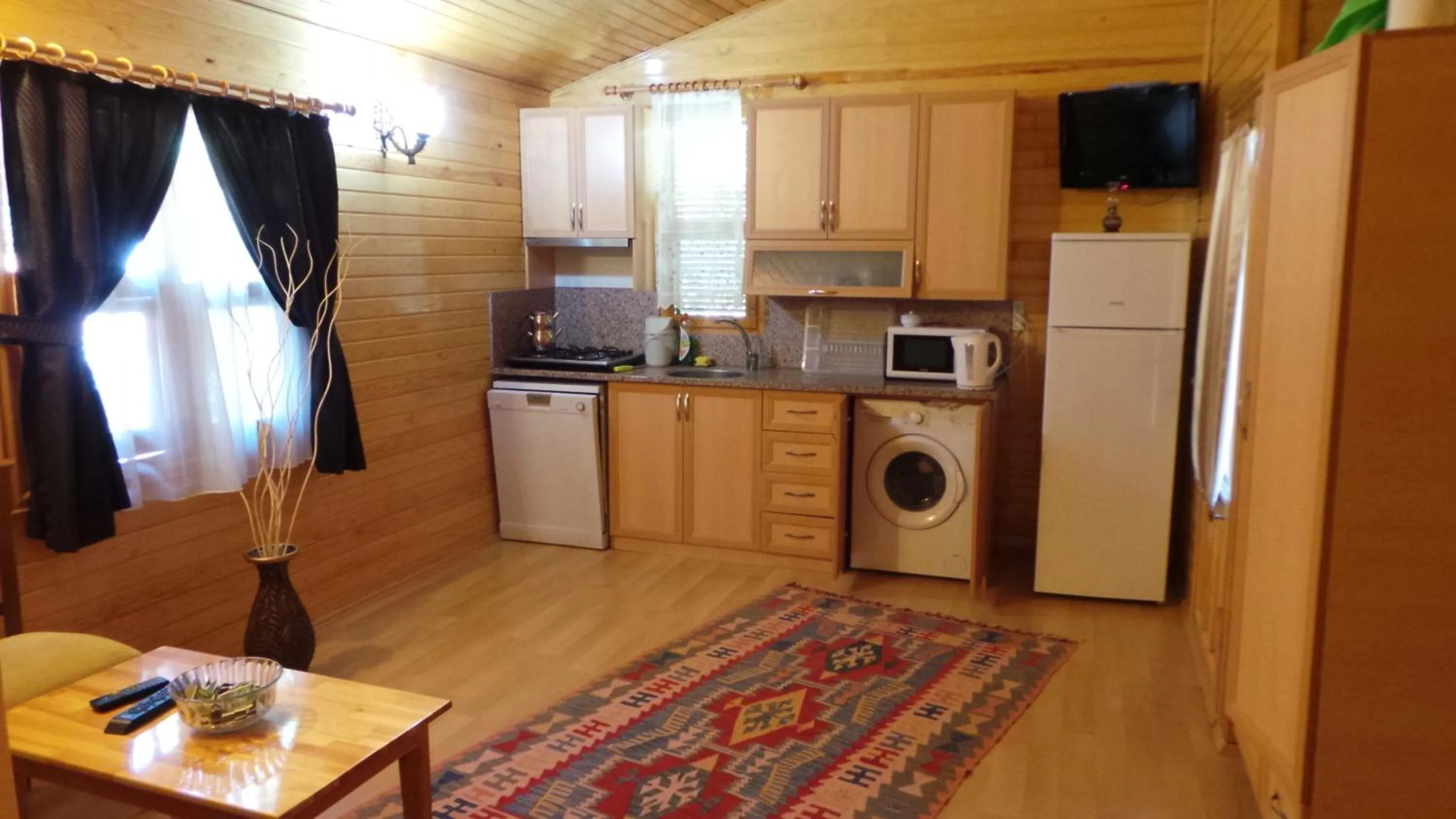 Kitchen or kitchenette in Mercan Bungalow