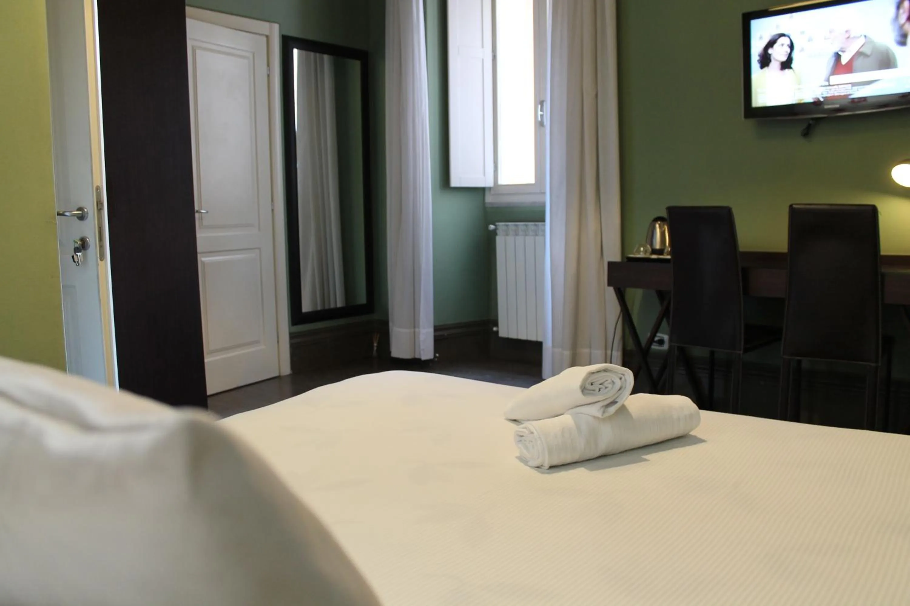 Bed in Relais Palazzo Taverna