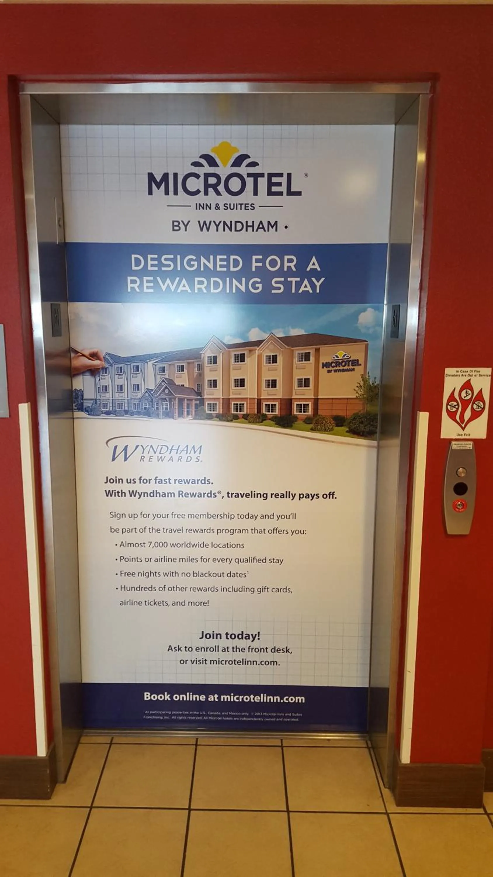 Property logo or sign in Microtel Inn & Suites by Wyndham Tuscaloosa