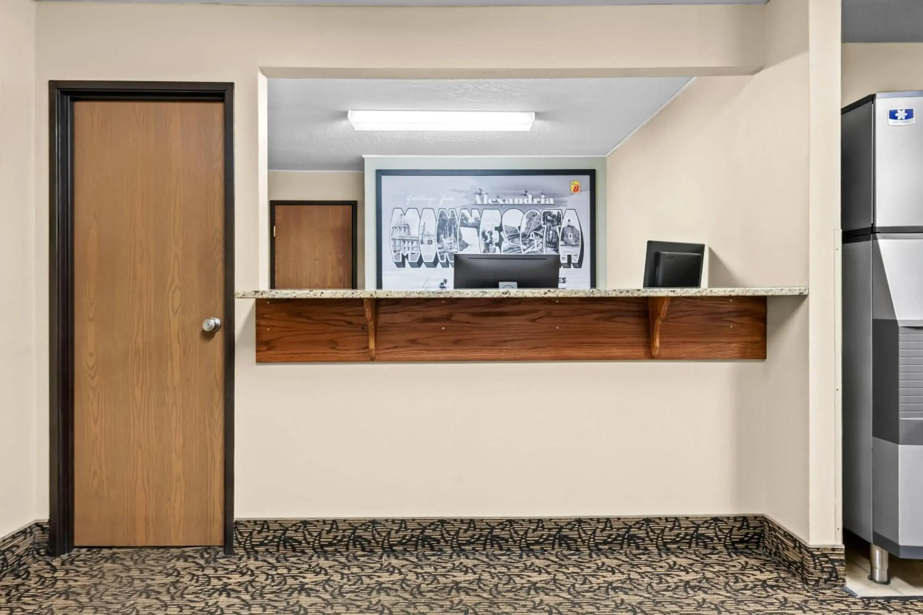 Lobby or reception in Super 8 by Wyndham Alexandria MN Lobby or reception in Super 8 by Wyndham Alexandria MN