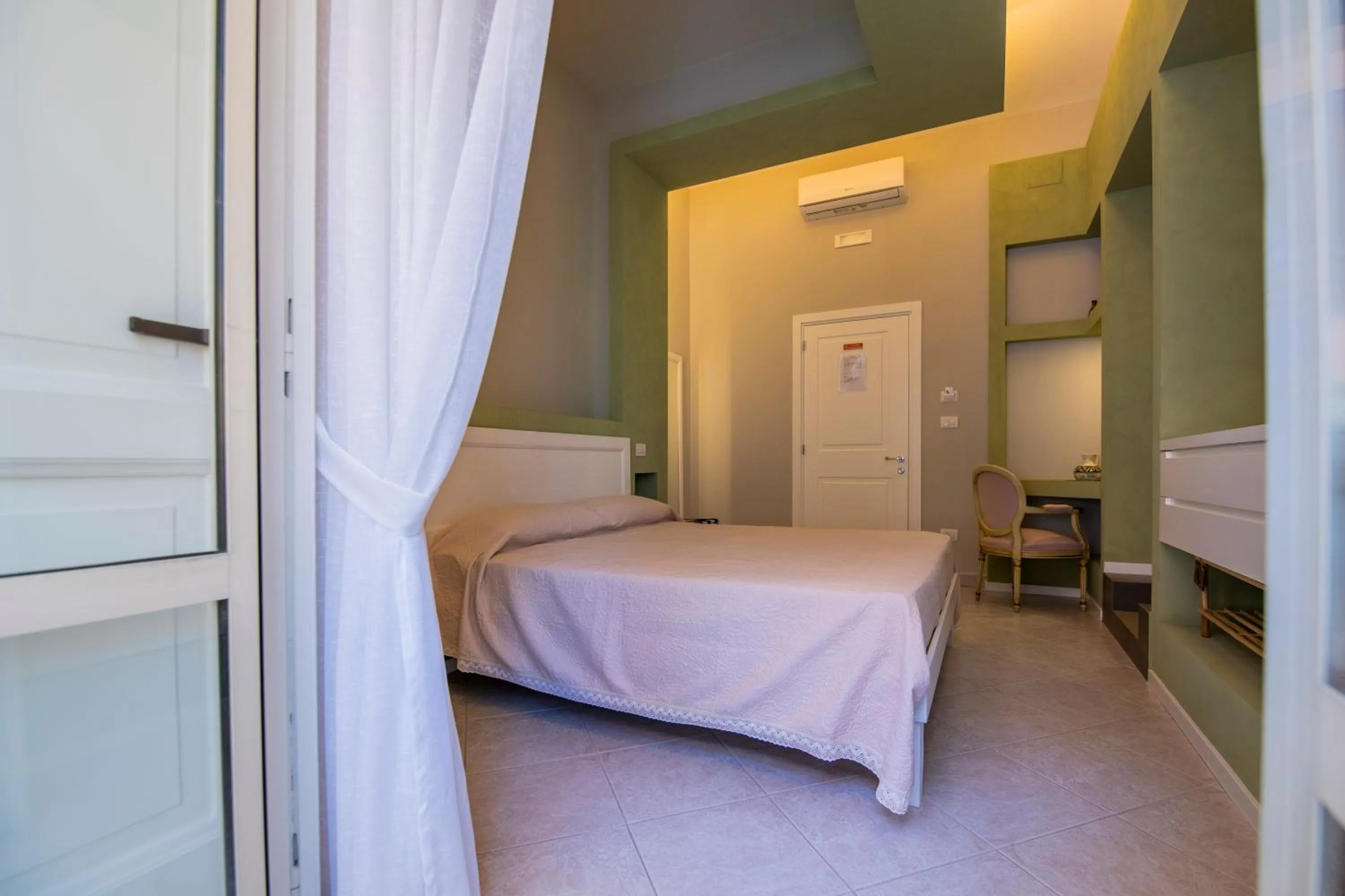 Bed in Mercatello Bed and Breakfast