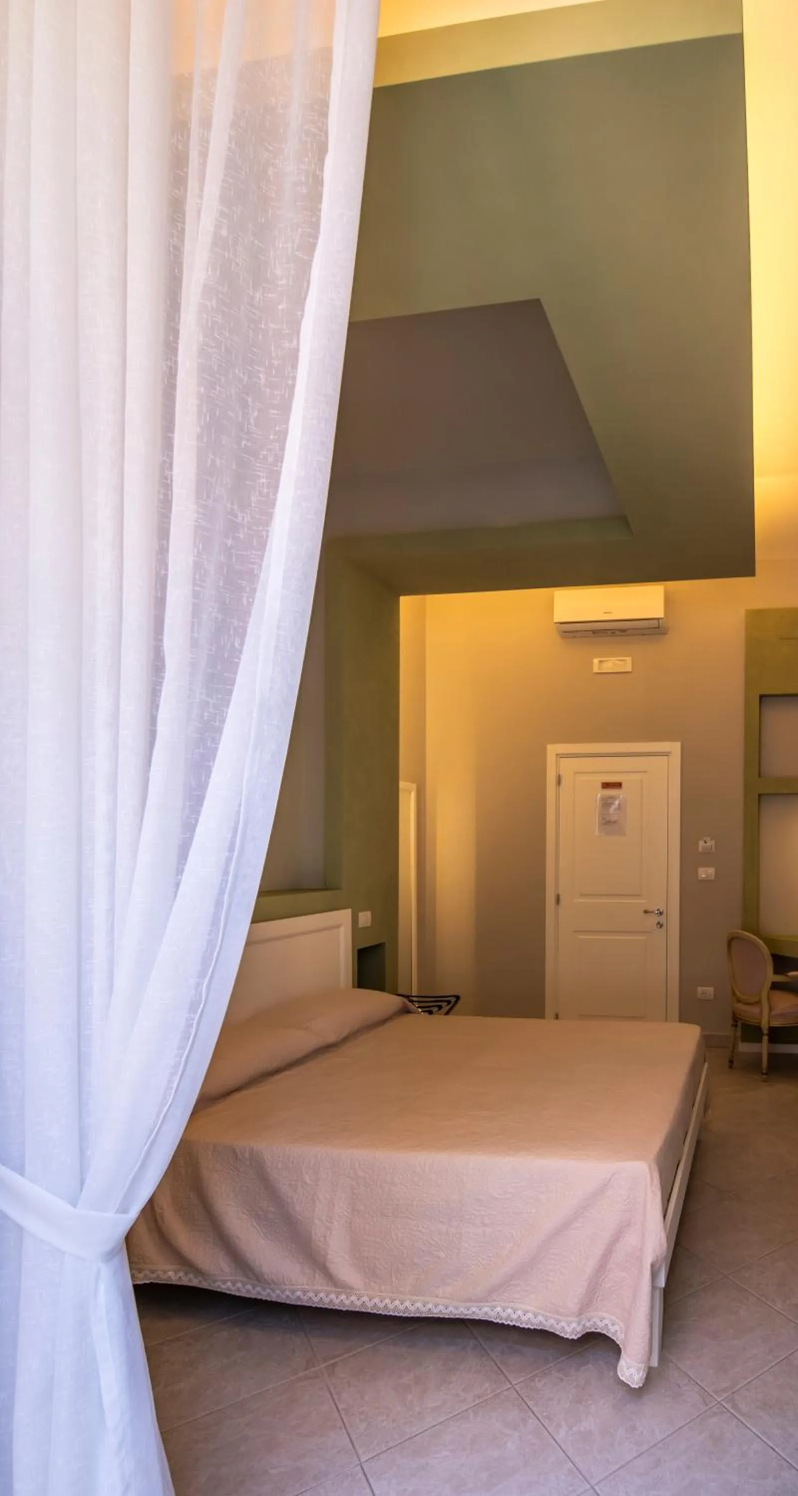 Bed in Mercatello Bed and Breakfast