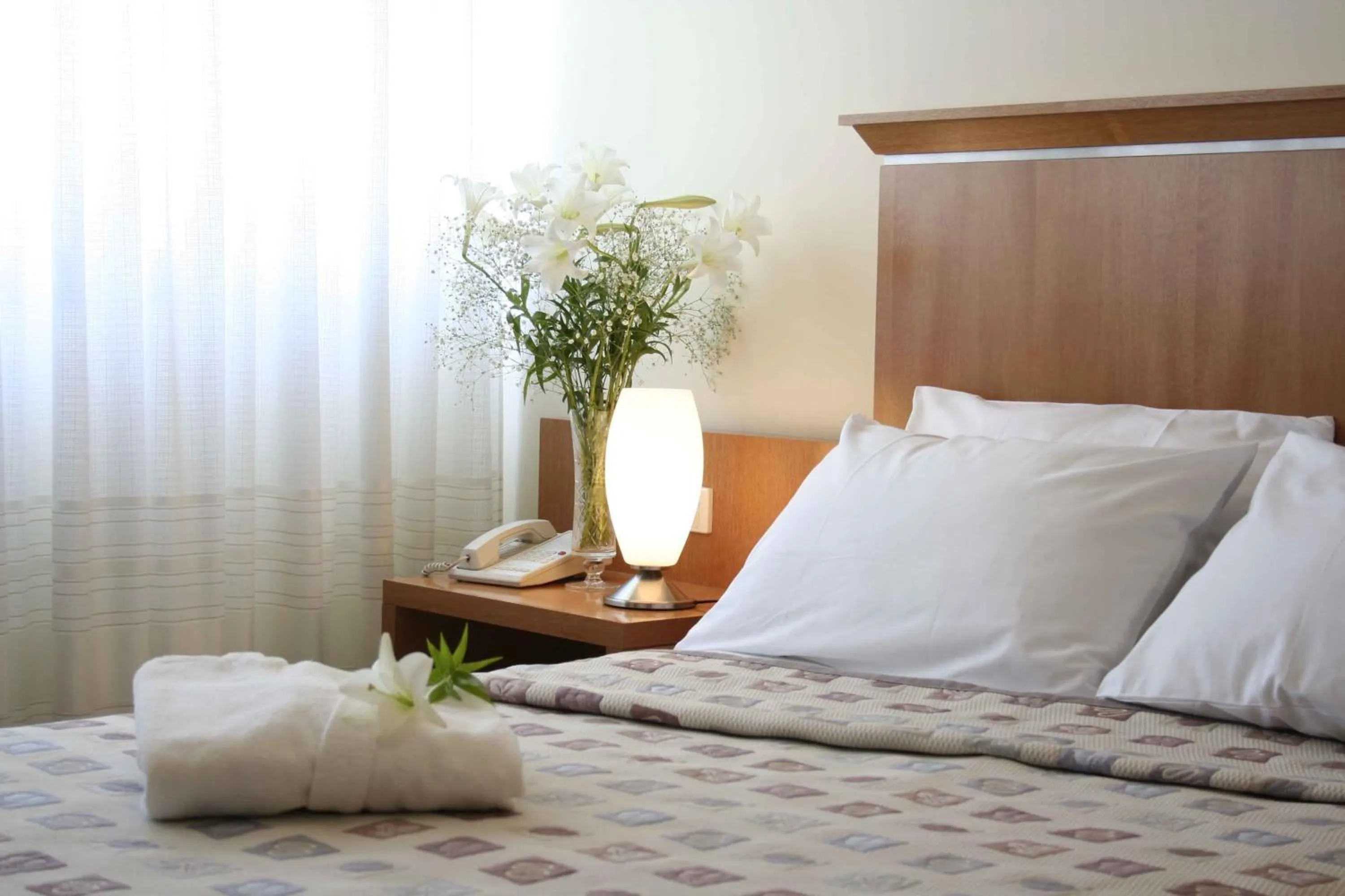 Bed in Ariston Hotel