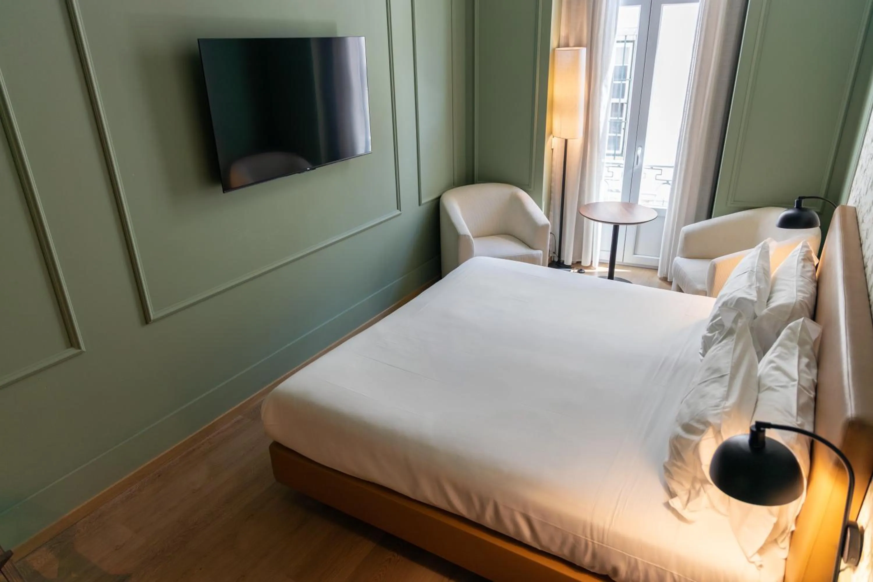 Bed in Lisboa Carmo Hotel