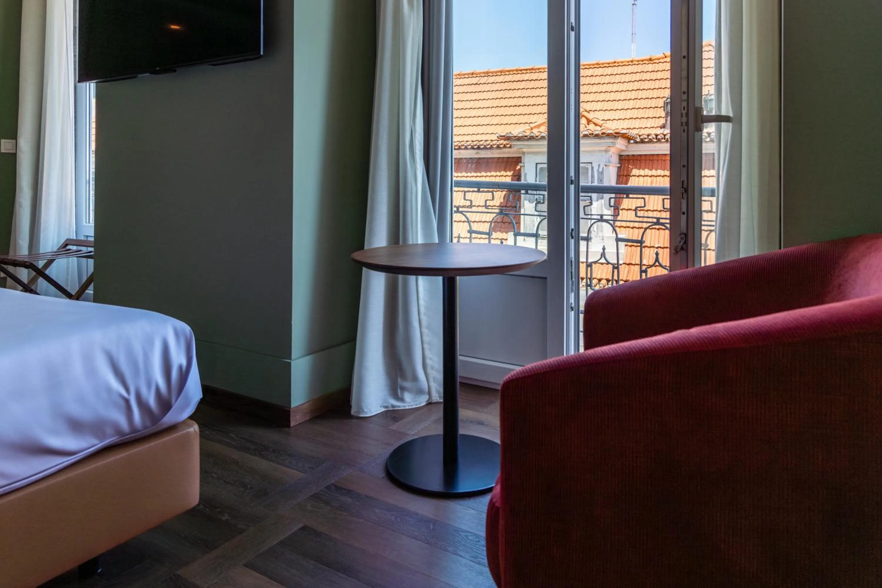 Bed in Lisboa Carmo Hotel