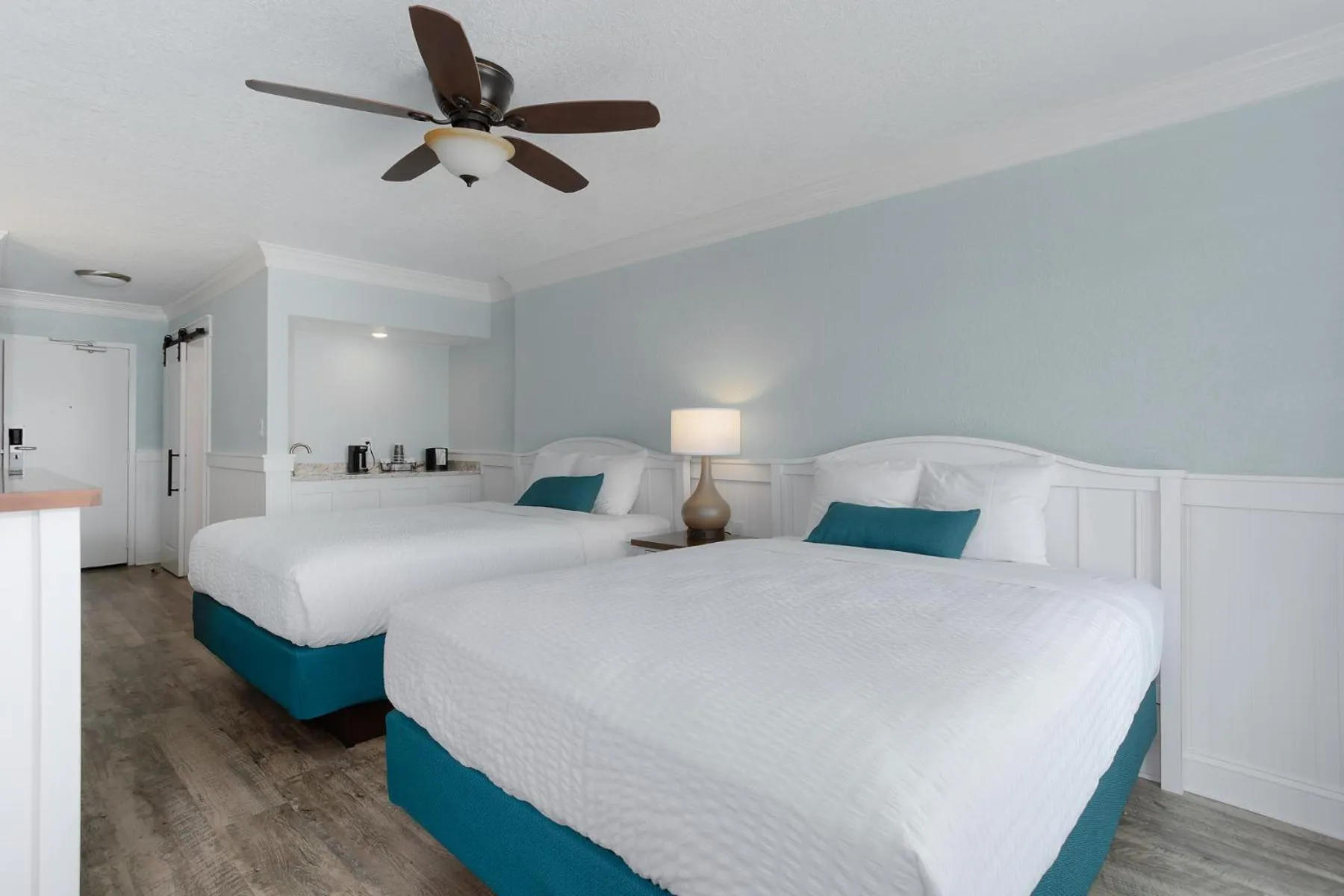 Bed in John Yancey Oceanfront Inn