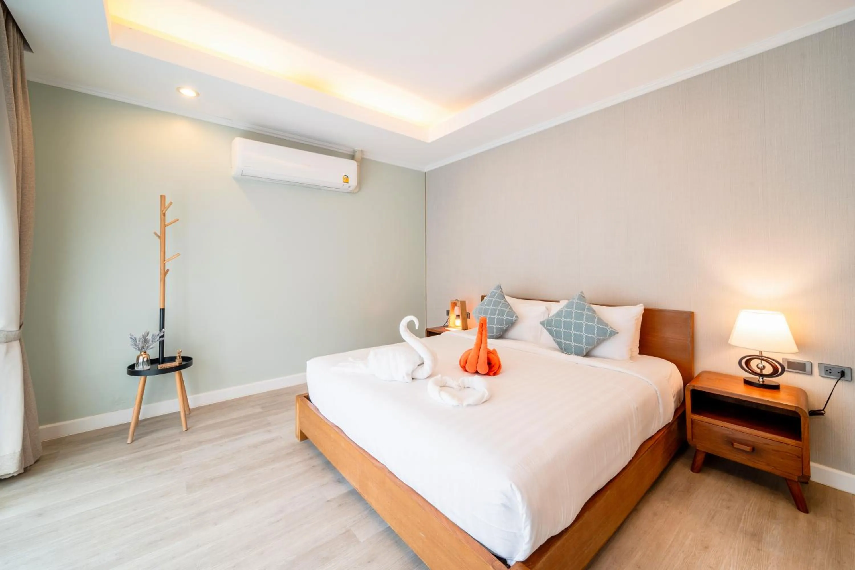 Bed in The Kiri Villas Resort