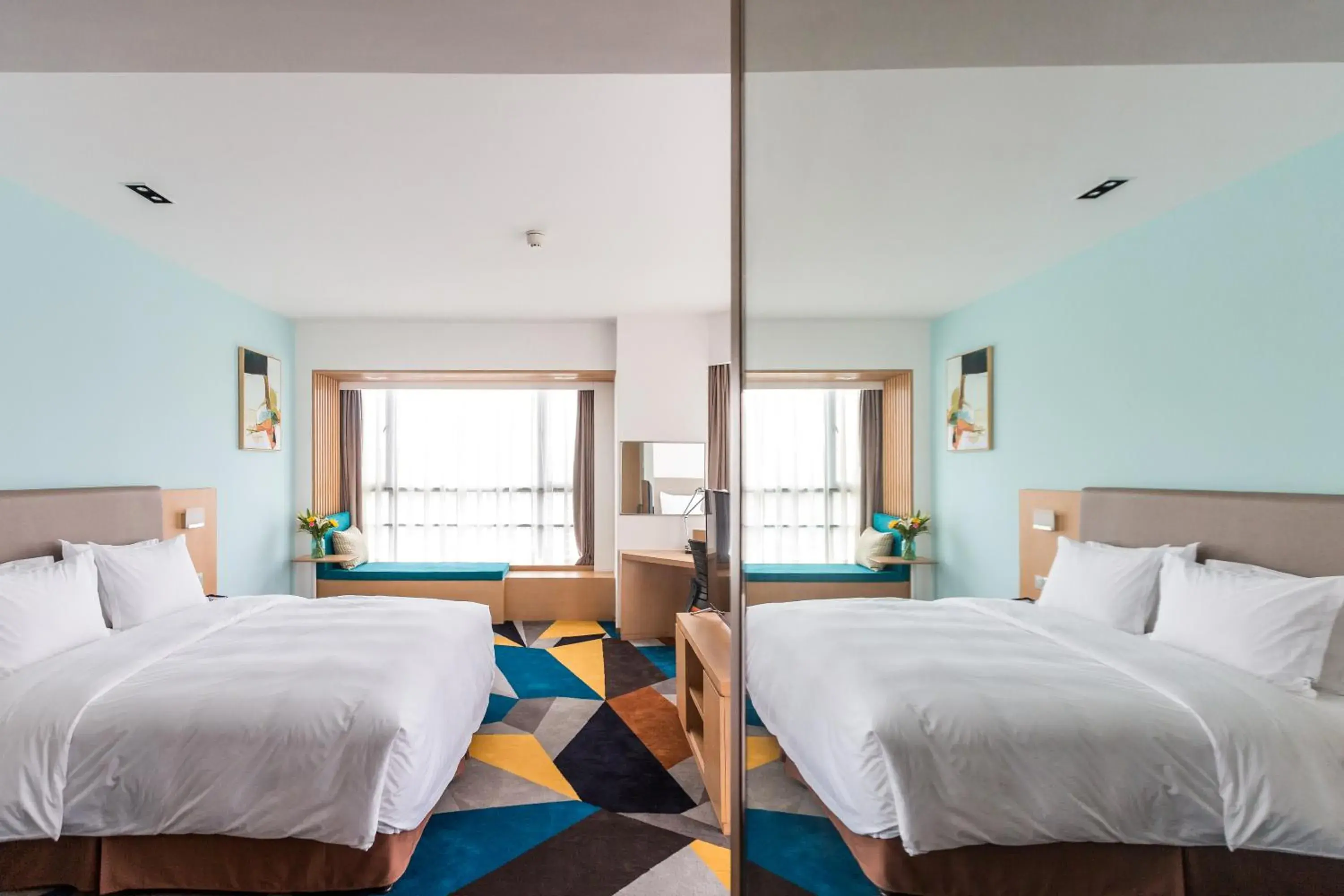 Bed in Holiday Inn Express Chengdu Xindu by IHG Bed in Holiday Inn Express Chengdu Xindu by IHG