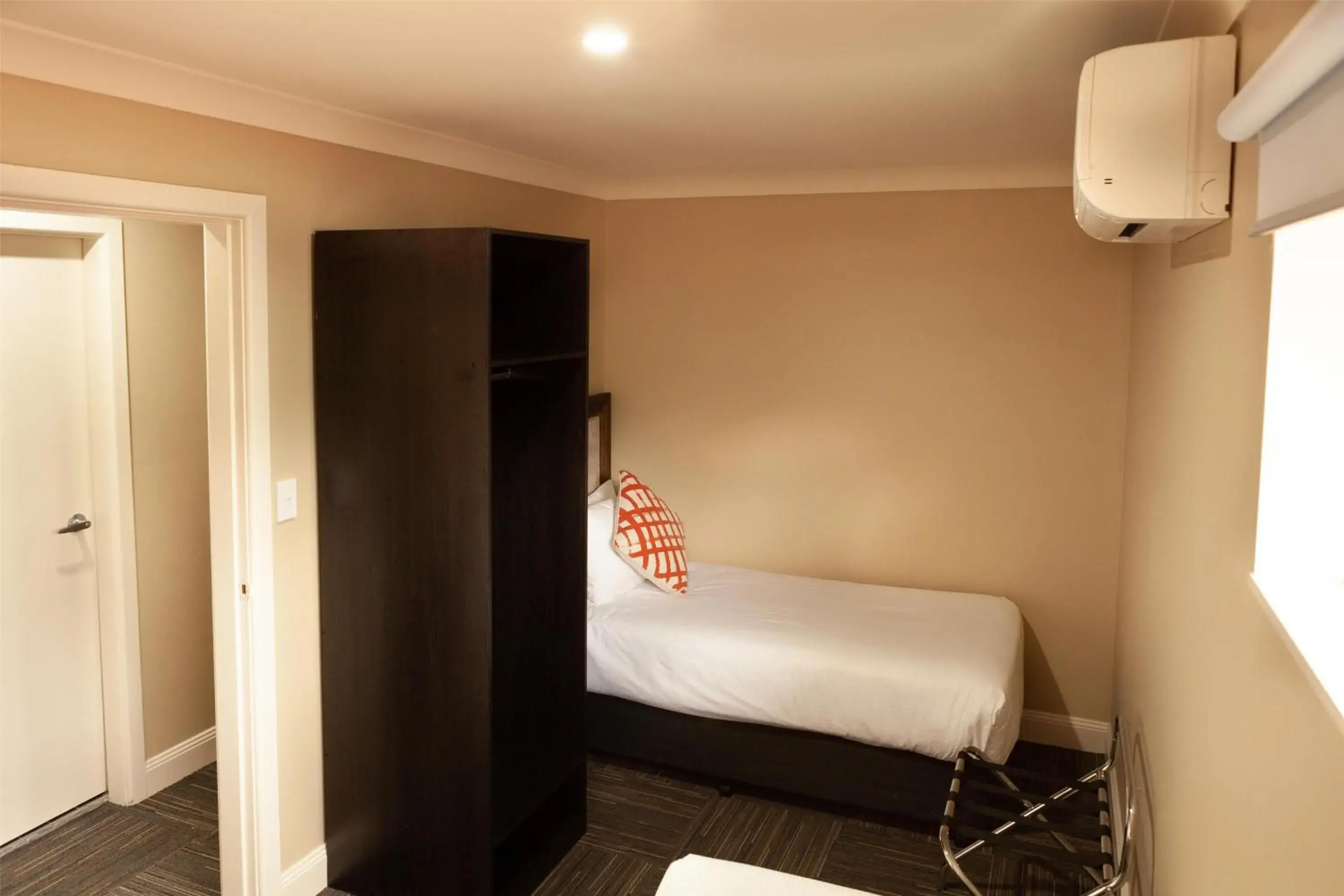 Bedroom, Bed in Nightcap at Archer Hotel Bedroom, Bed in Nightcap at Archer Hotel