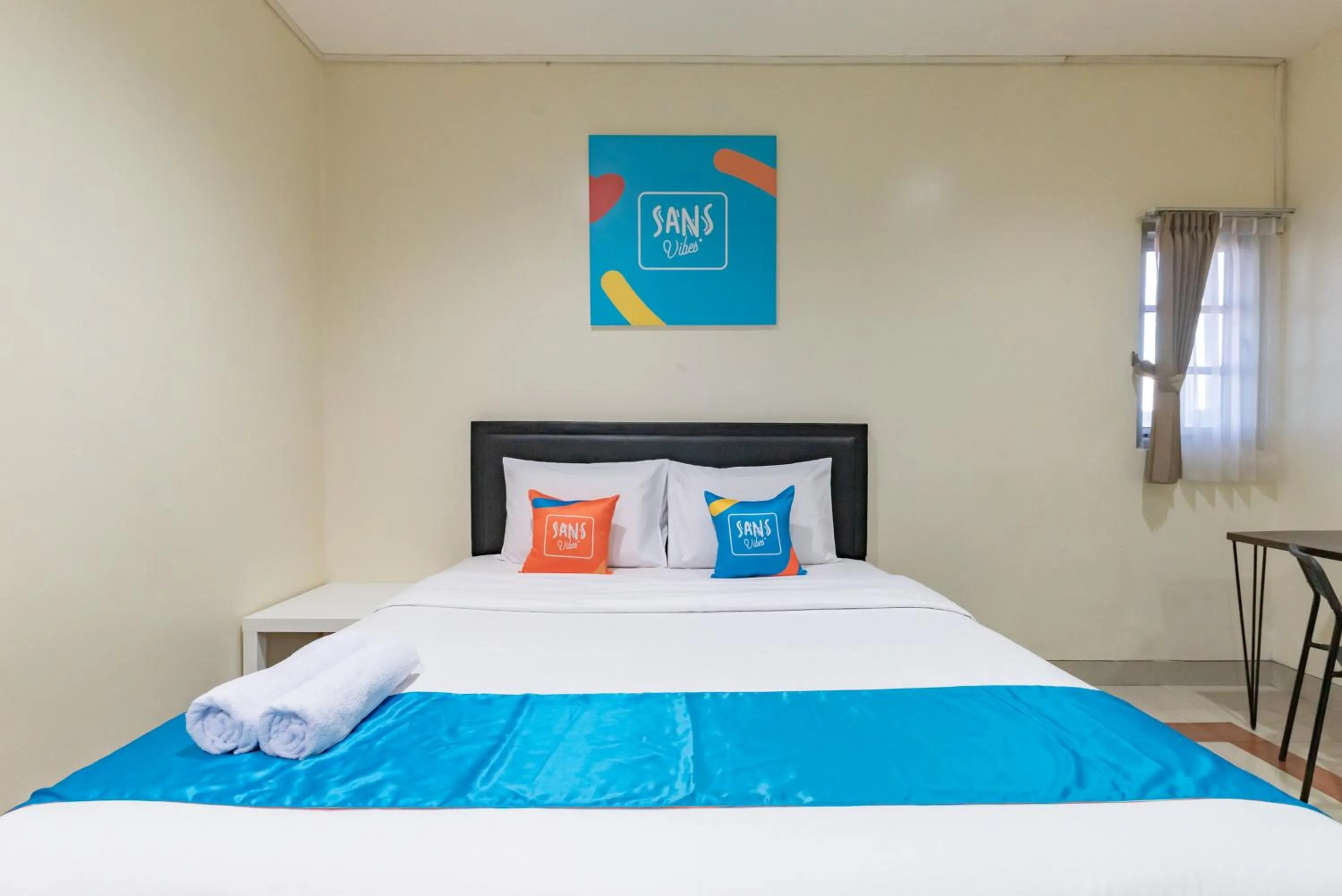 Bedroom, Bed in Sans Vibes Hotel Malabar