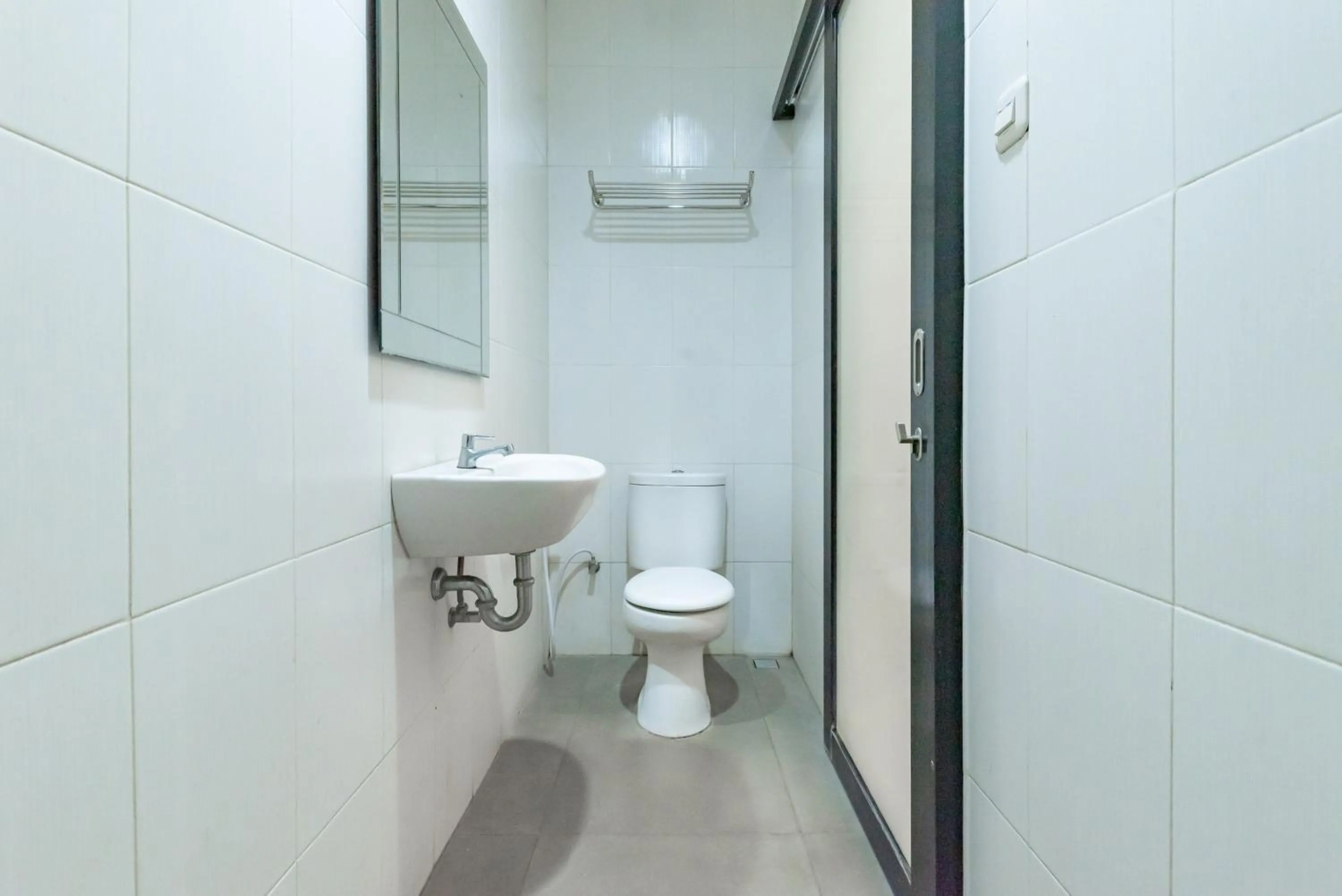 Bathroom in Sans Vibes Hotel Malabar