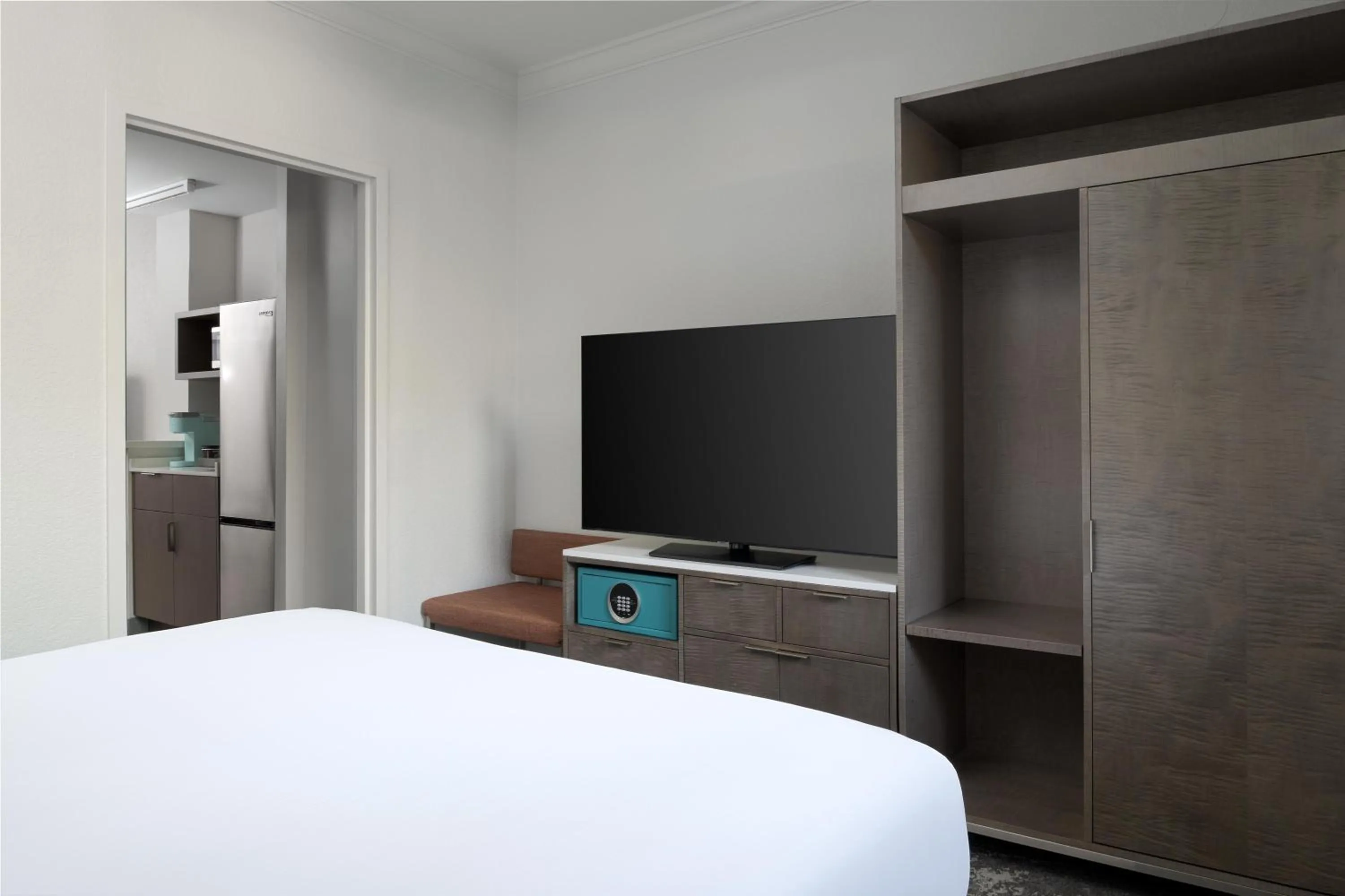 Bed in Hilton Boca Raton Suites