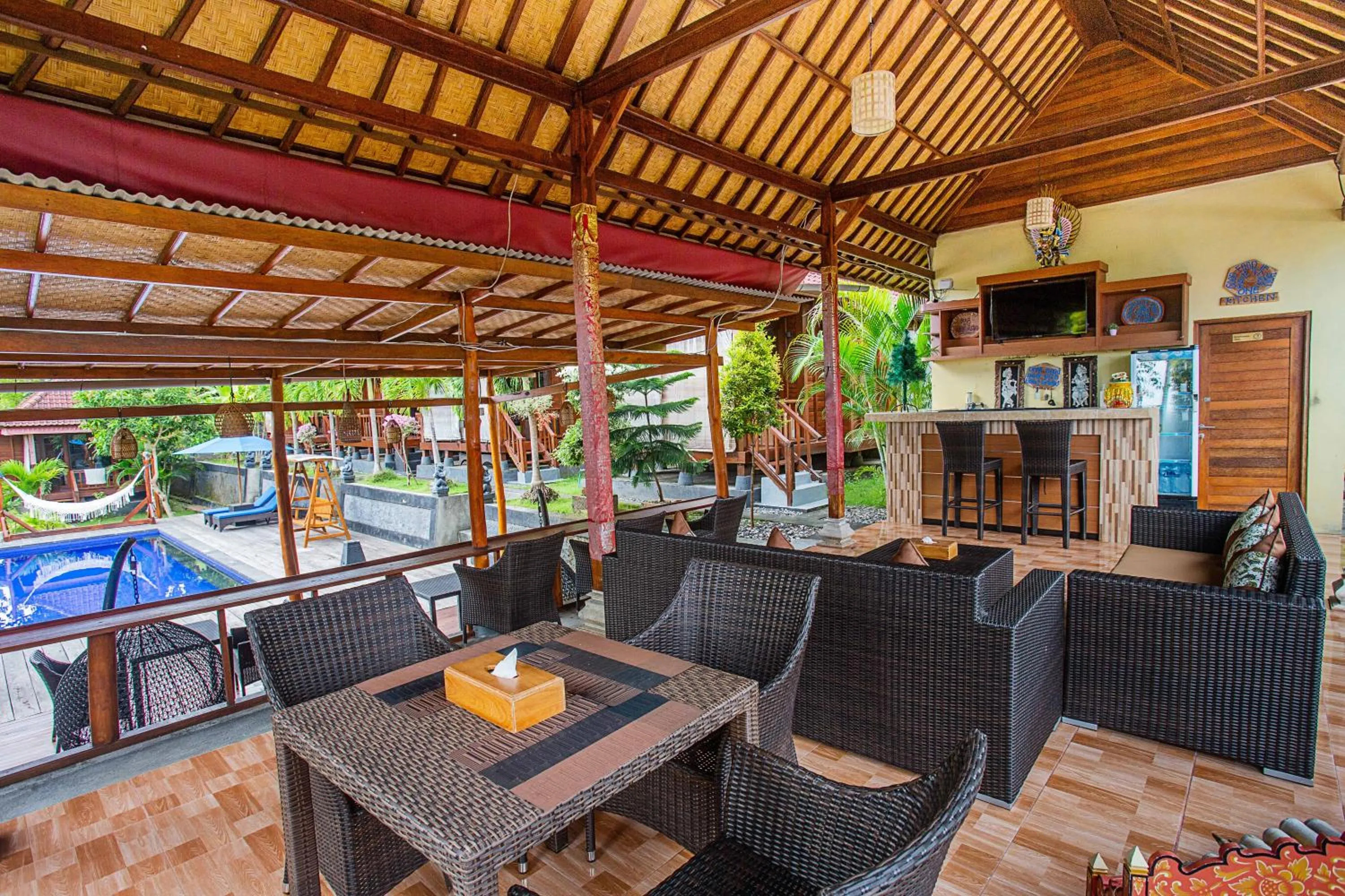 Communal lounge/ TV room in Tatak Bunut Villa Ceningan