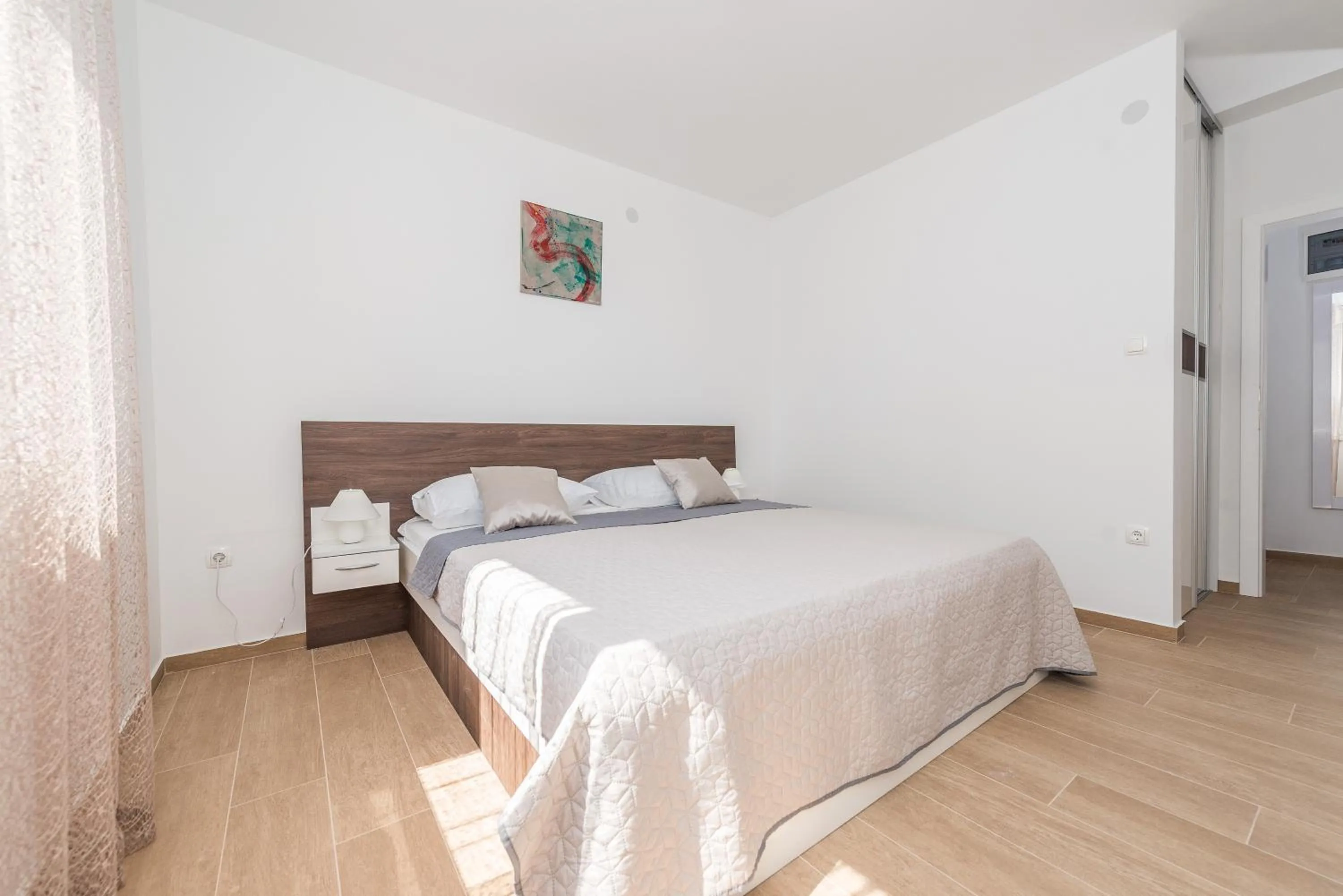 Bed in Villa Star 6 luxury apartment with a pool