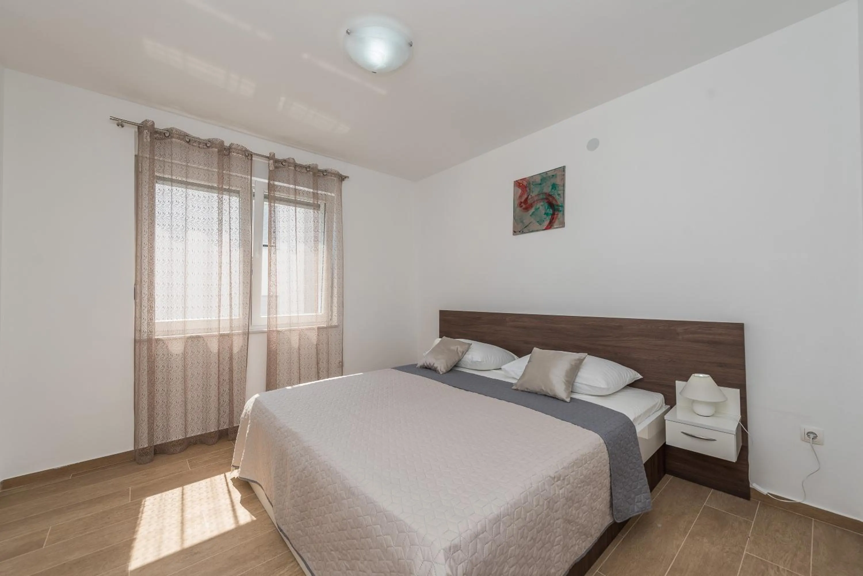 Bed in Villa Star 6 luxury apartment with a pool