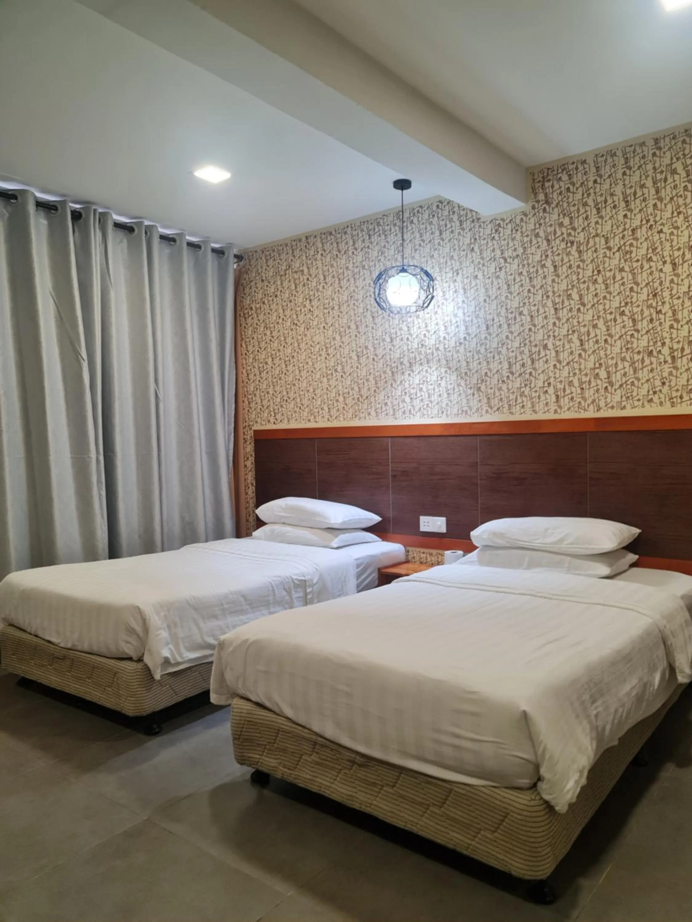 Bed in Hotel Bestari