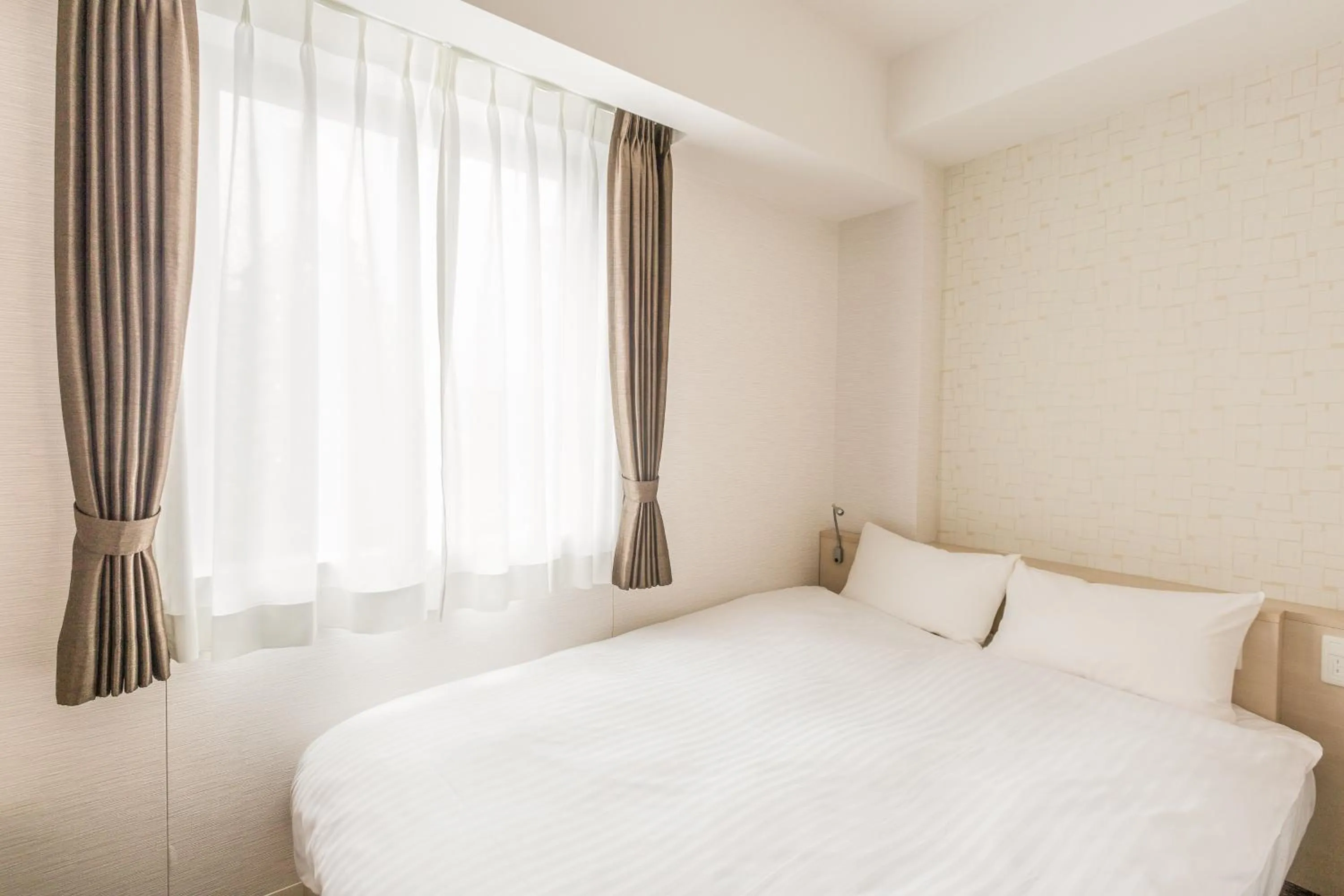 Photo of the whole room, Bed in EIWA PLACE HOTEL Hakata