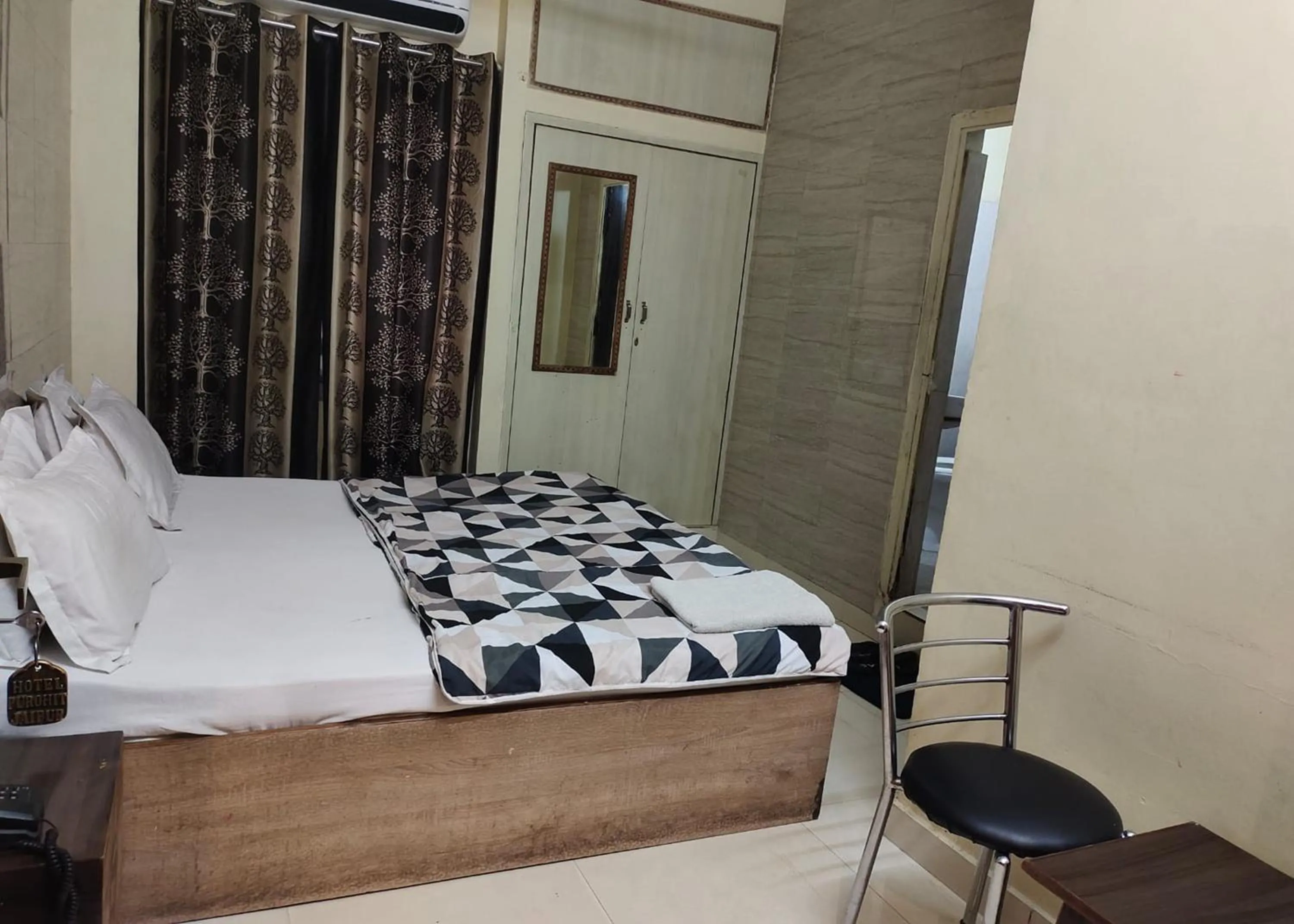 Bedroom, Bed in Hotel Purohit Sindhi Camp