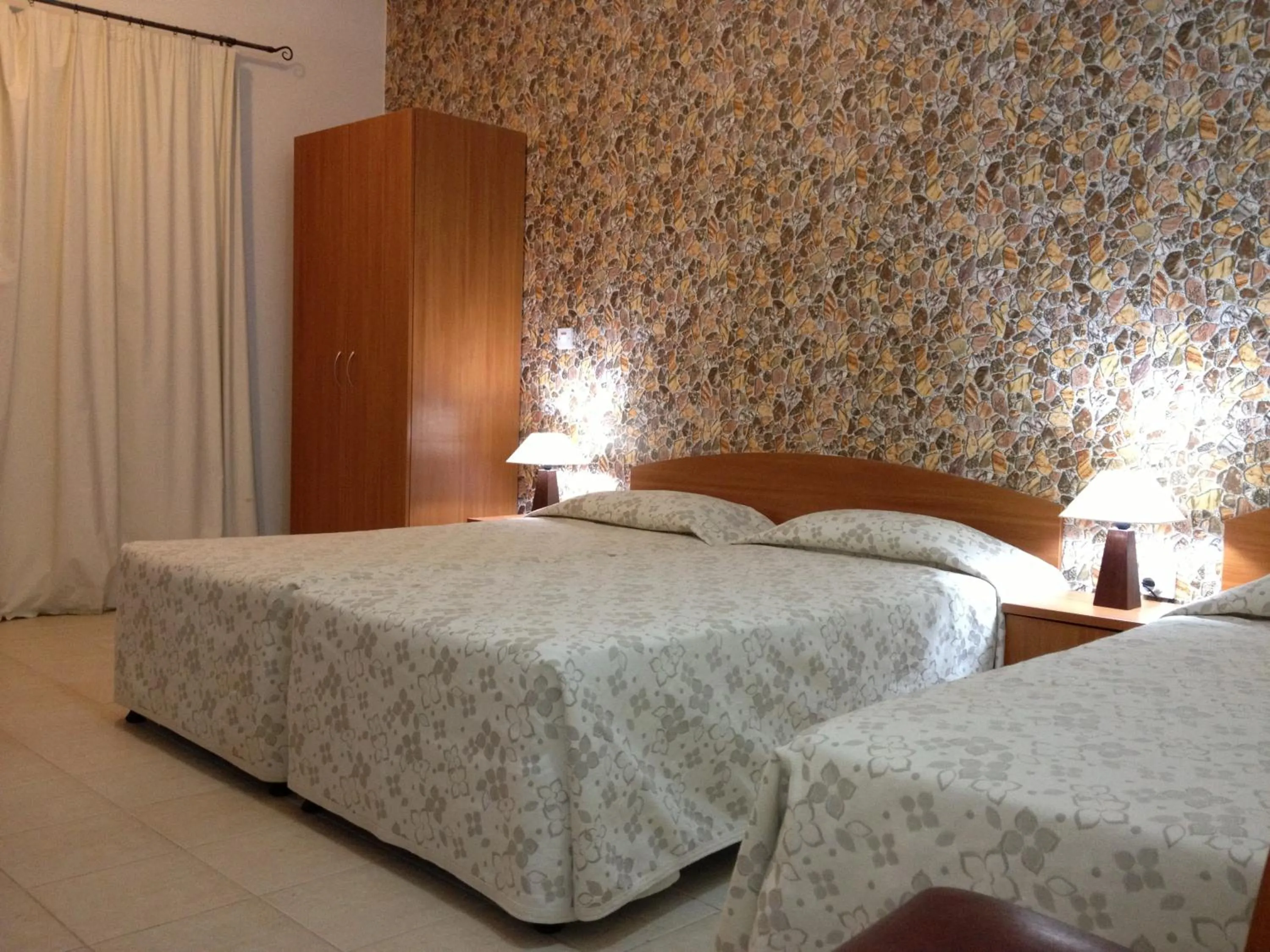 Bed in Palates Hotel