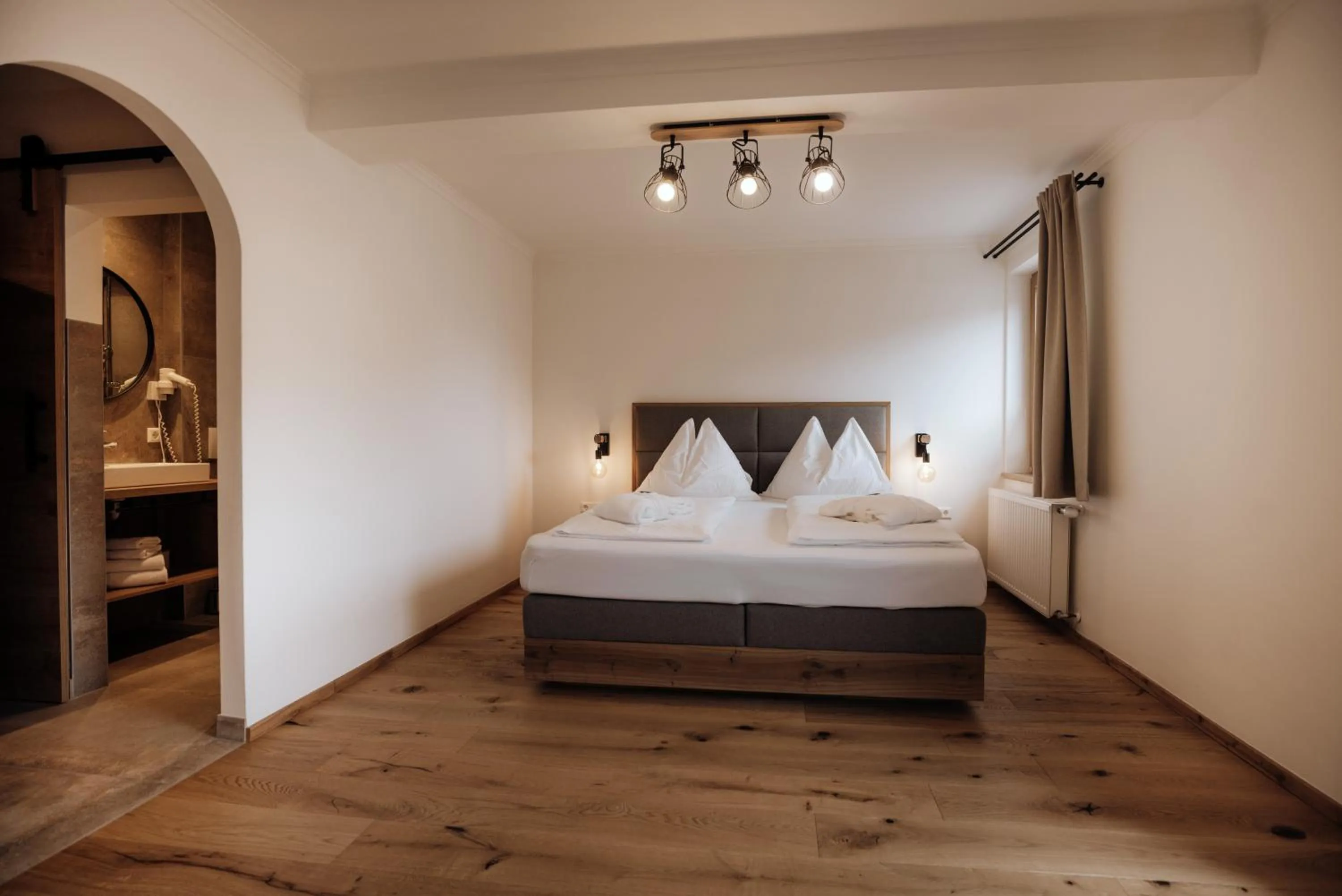Photo of the whole room, Bed in FORSTAUERWiRT Hotel & Restaurant