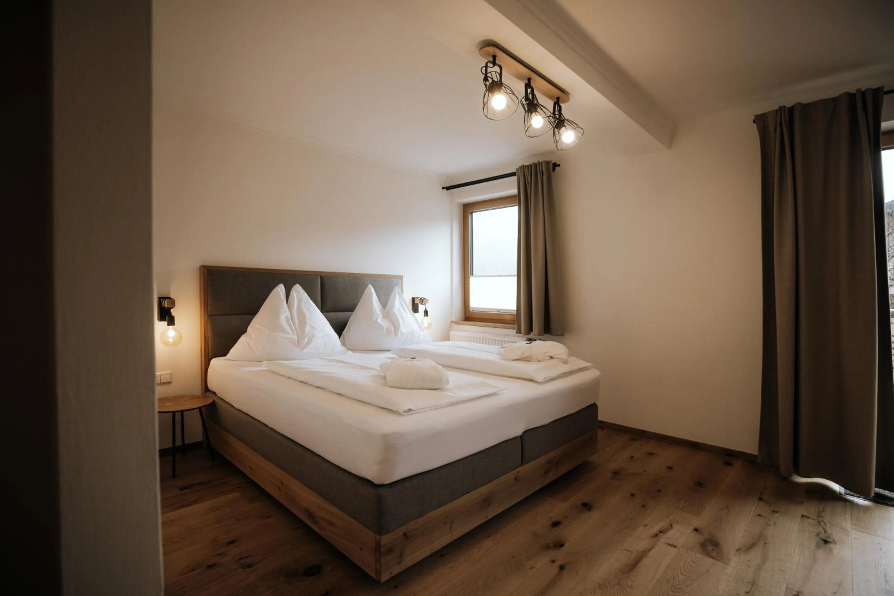 Photo of the whole room, Bed in FORSTAUERWiRT Hotel & Restaurant