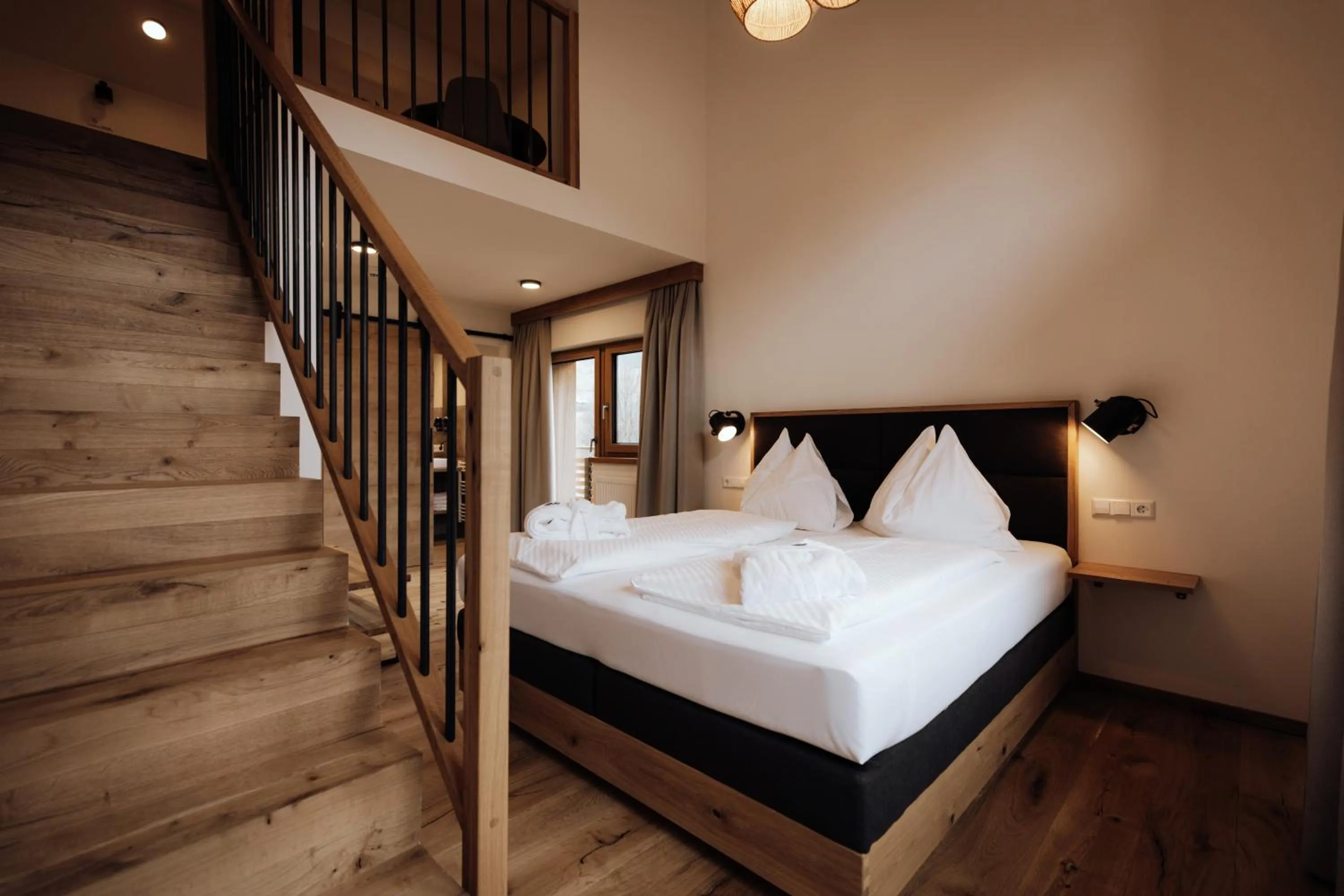 Bed in FORSTAUERWiRT Hotel & Restaurant