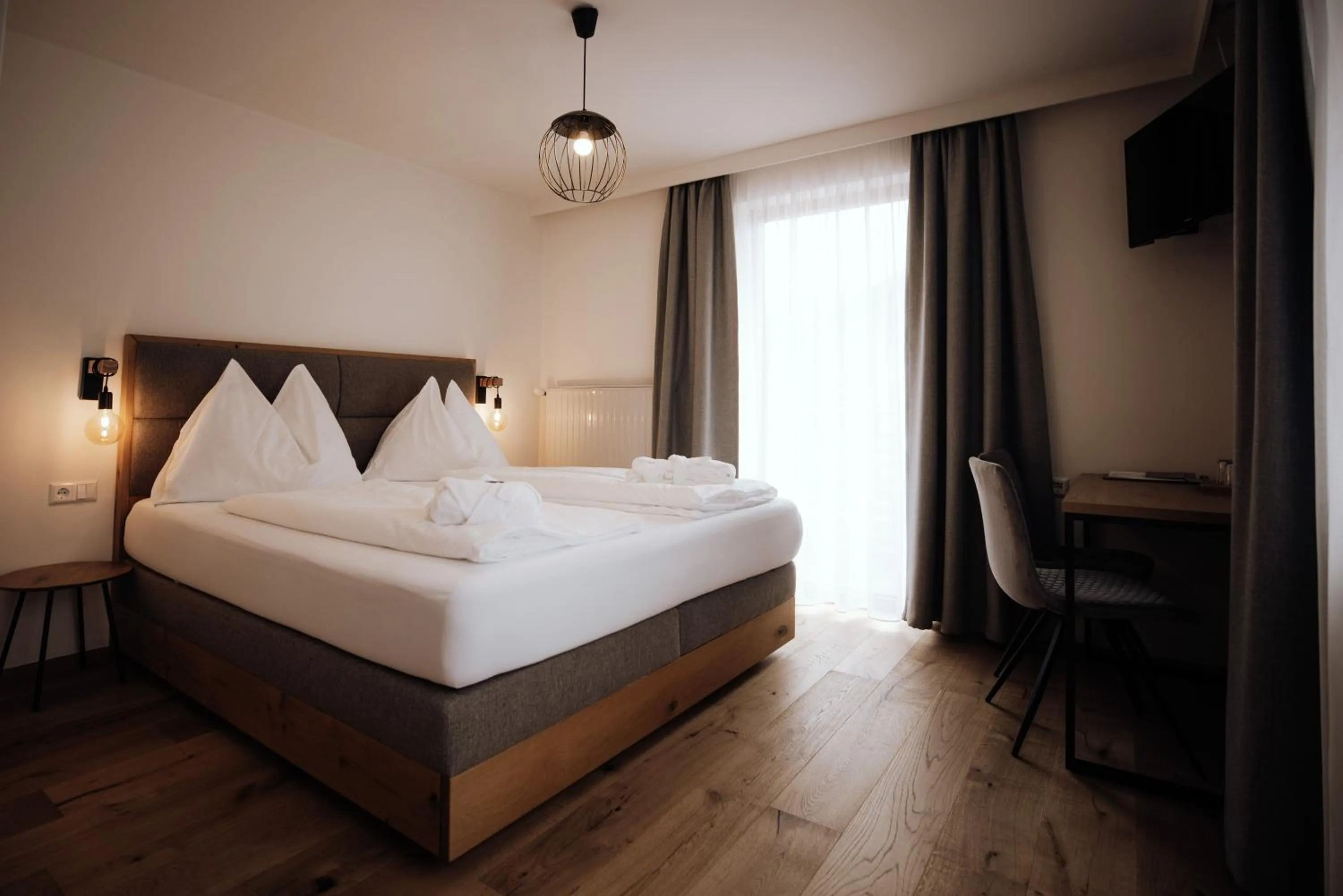 Photo of the whole room, Bed in FORSTAUERWiRT Hotel & Restaurant