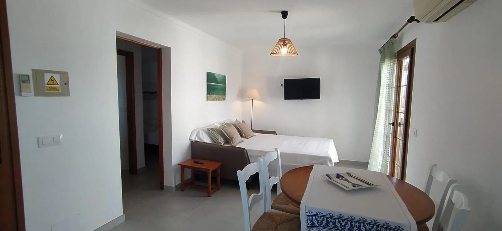TV and multimedia, Bed in Apartamentos Villa Primera