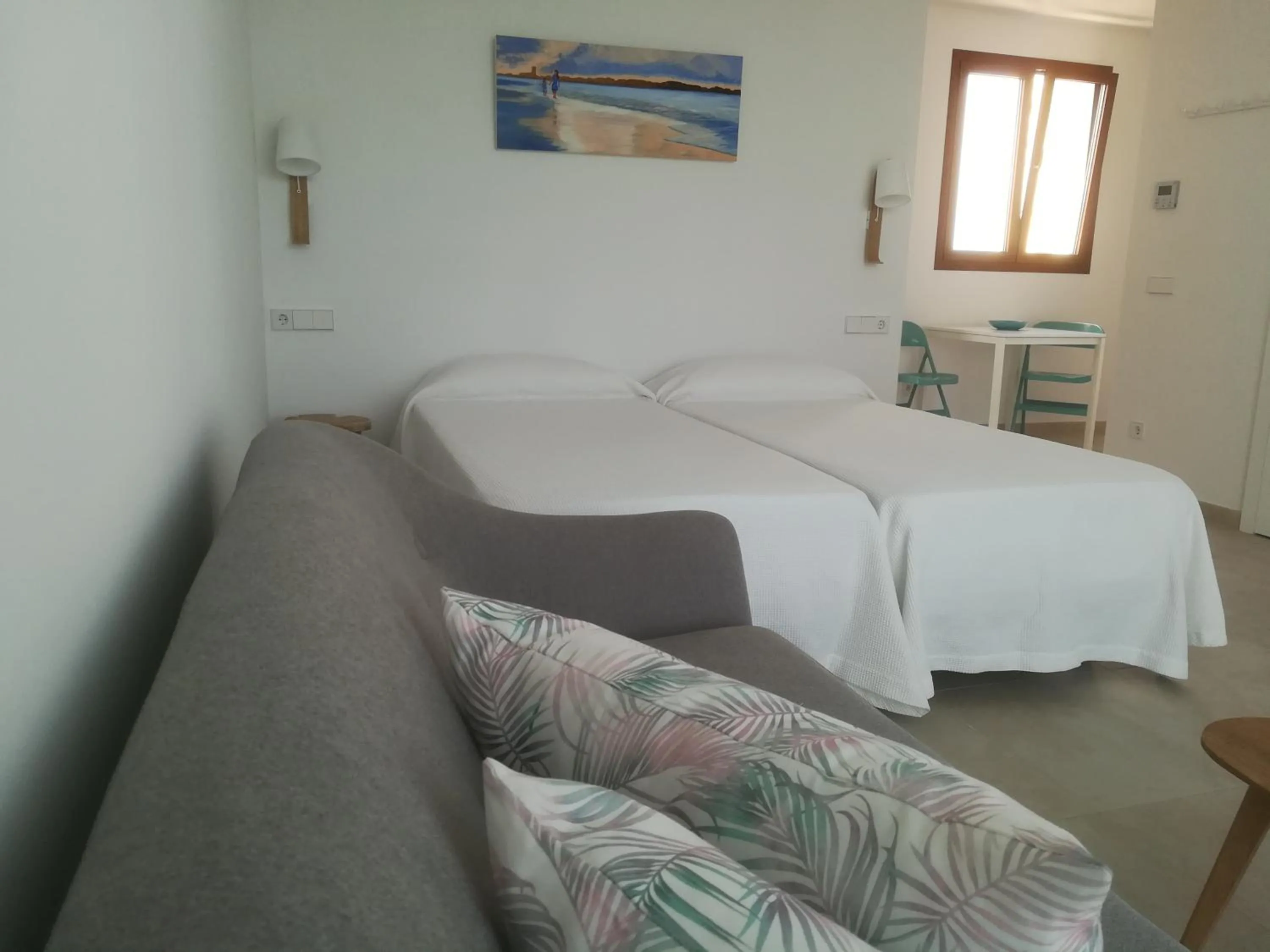 Seating area, Bed in Apartamentos Villa Primera
