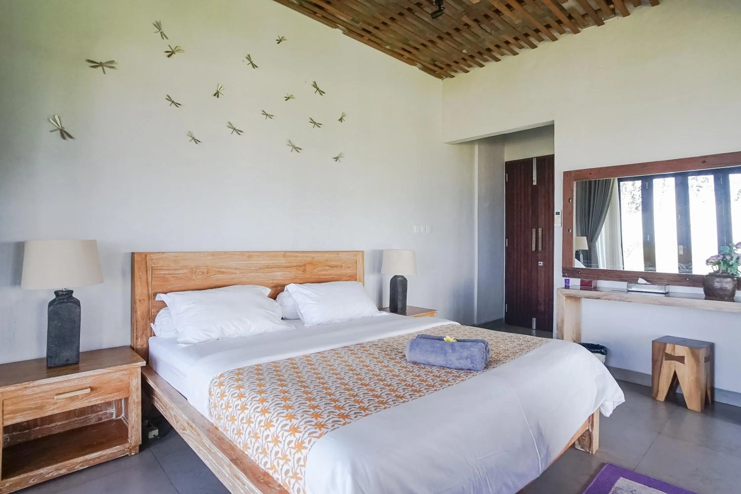 Bed in The Ocean Views Luxury Villas & Apartment