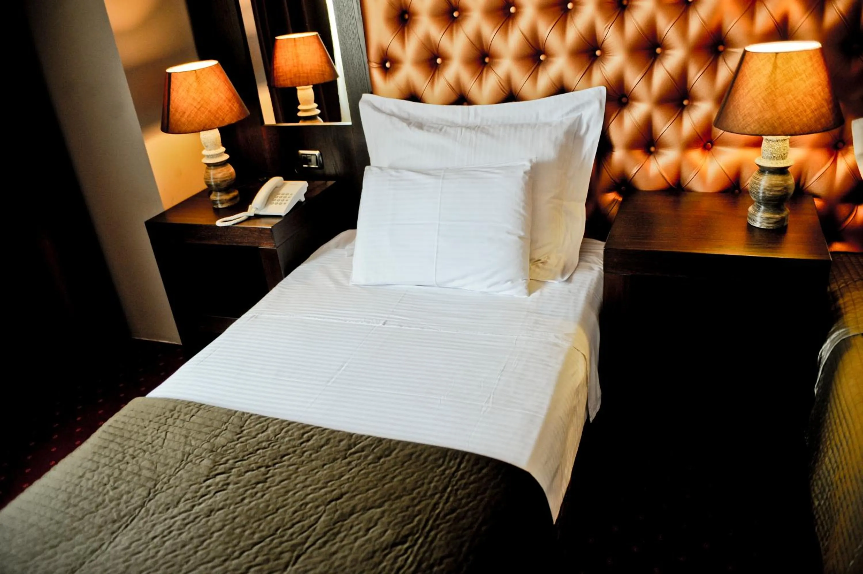 Living room, Bed in Hotel Doro City