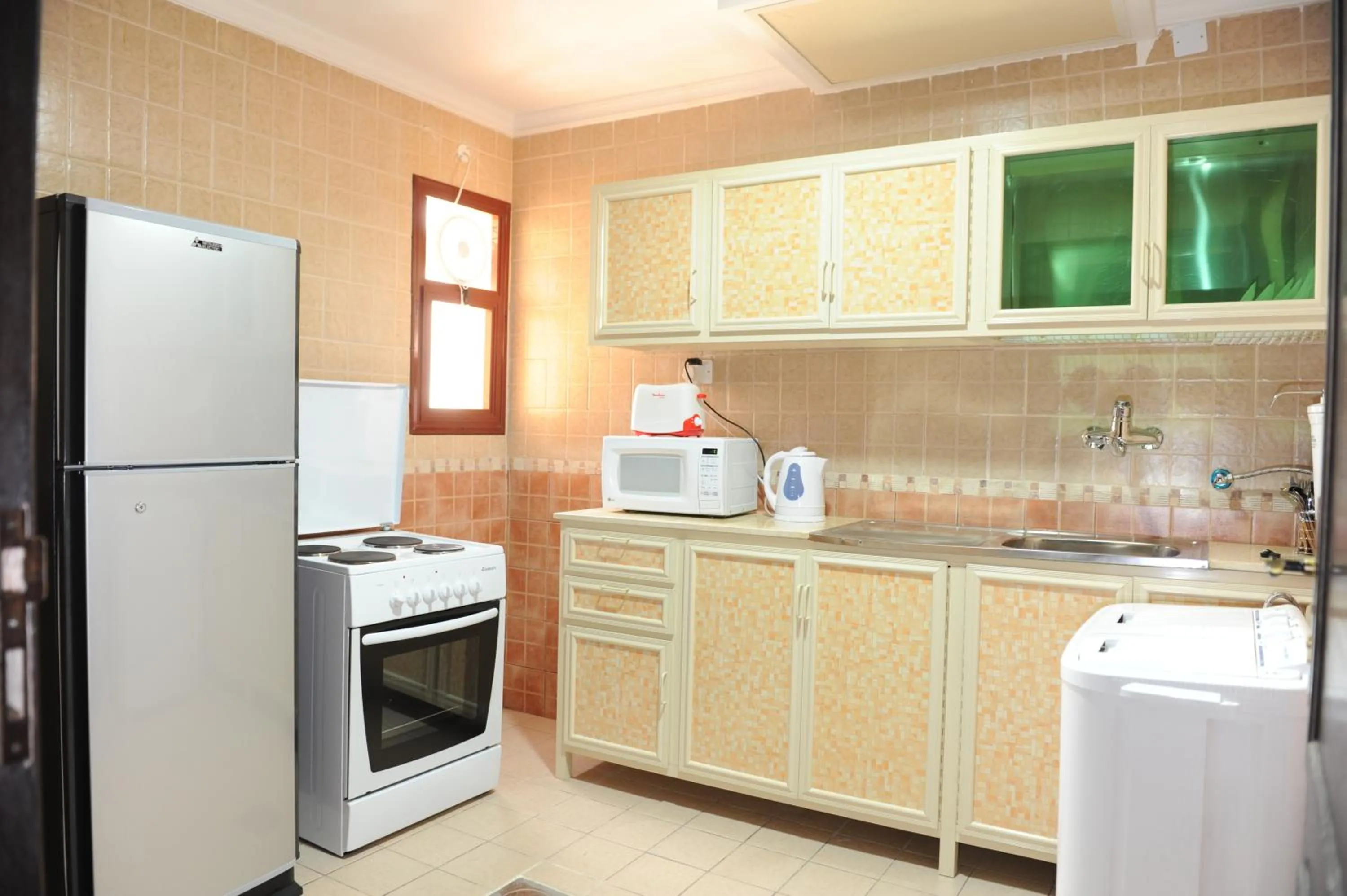 Kitchen or kitchenette in Terrace Furnished Apartments- Salmiya