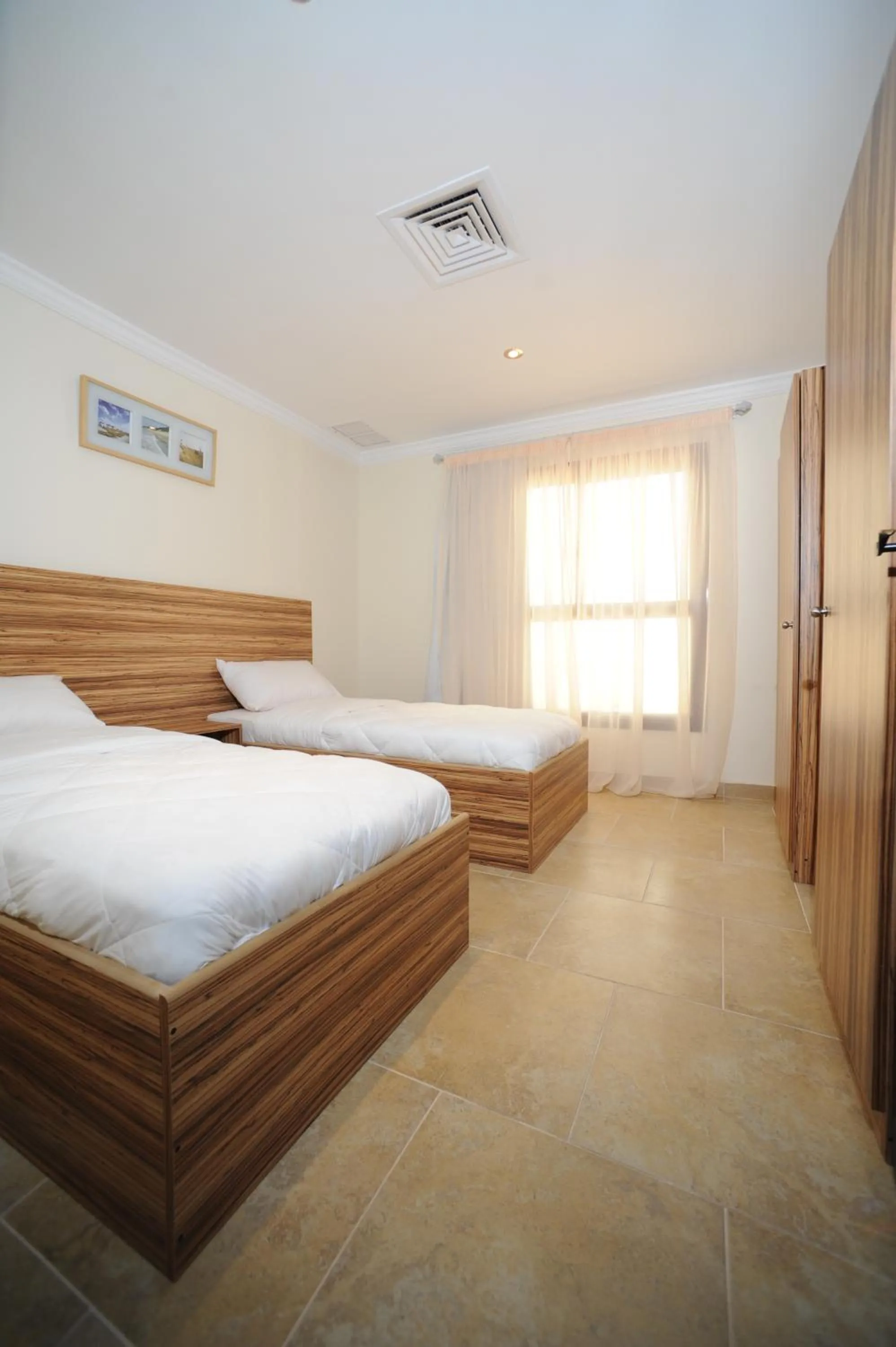 Bedroom, Bed in Terrace Furnished Apartments- Salmiya