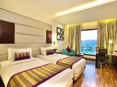 Photo of the whole room, Bed in Golden Tulip Chandigarh, Panchkula Photo of the whole room, Bed in Golden Tulip Chandigarh, Panchkula