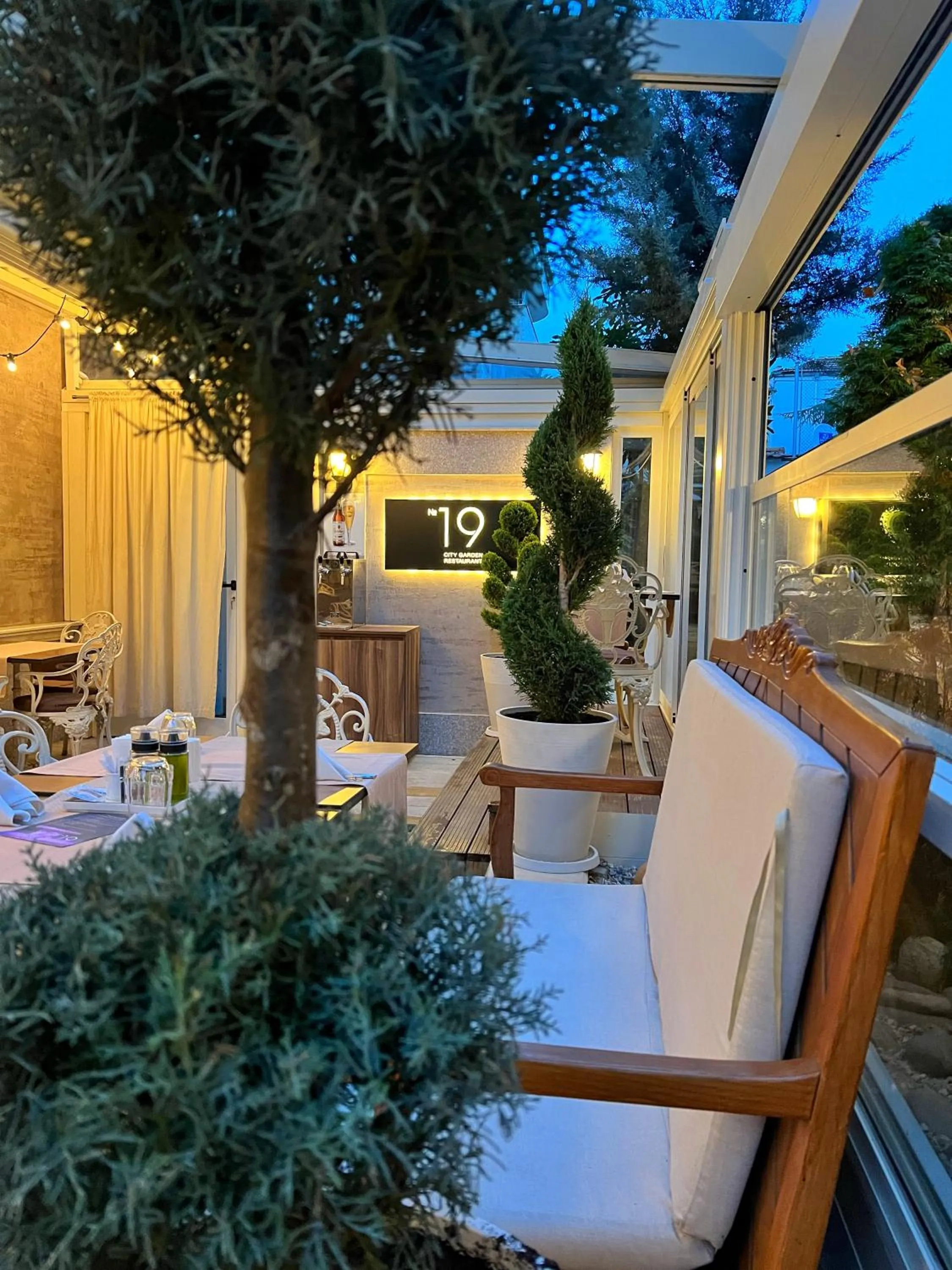 Patio in Residence City Garden - Certificate of Excellence Top 10 BEST Five-Stars City Hotels for 2024 awarded by HTIF